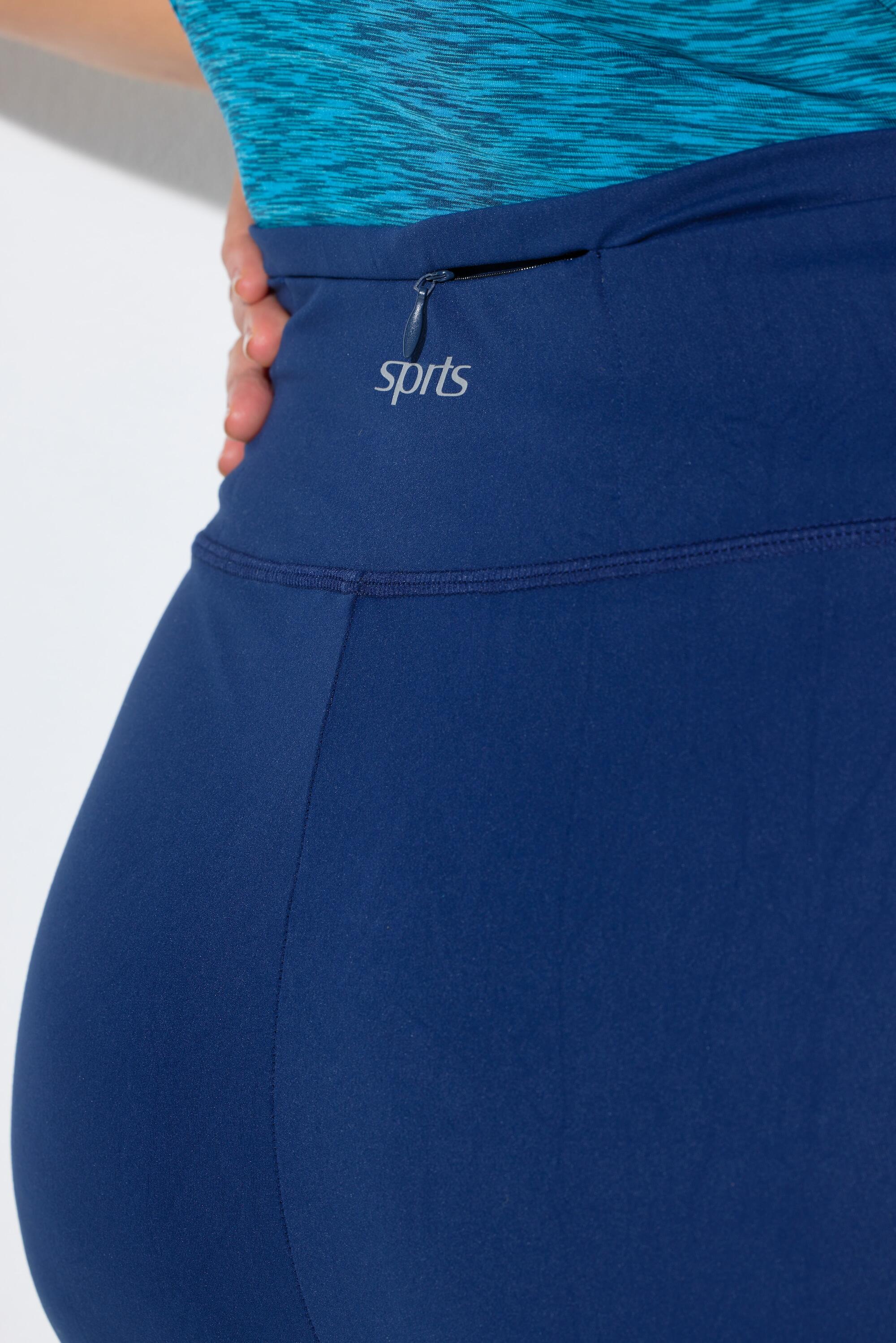 Femme Legging technique bas de jambe évasée et poche zippée 4/6
