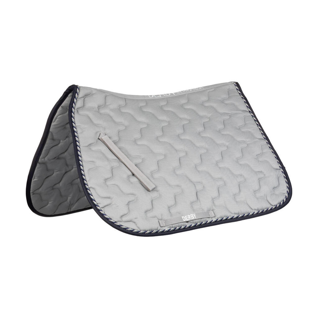 Saddle pad with piping cord
