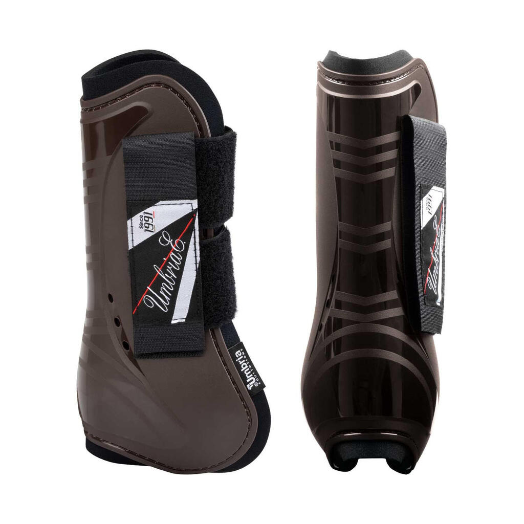 Neoprene tendon boots with plastic reinforcement