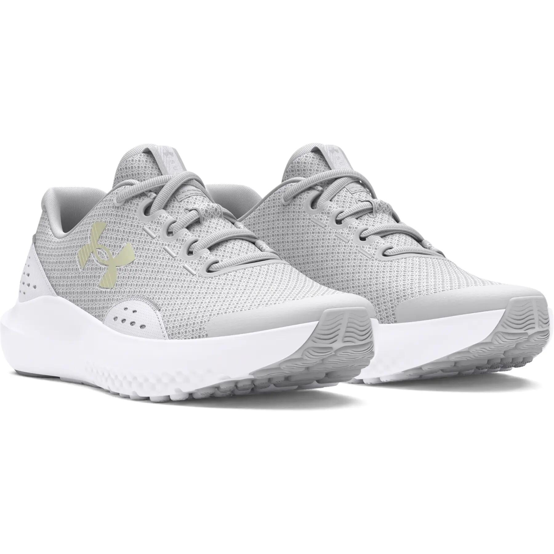 Sapatilhas de running para meninas do ensino fundamental Under Armour Surge 4 2/7