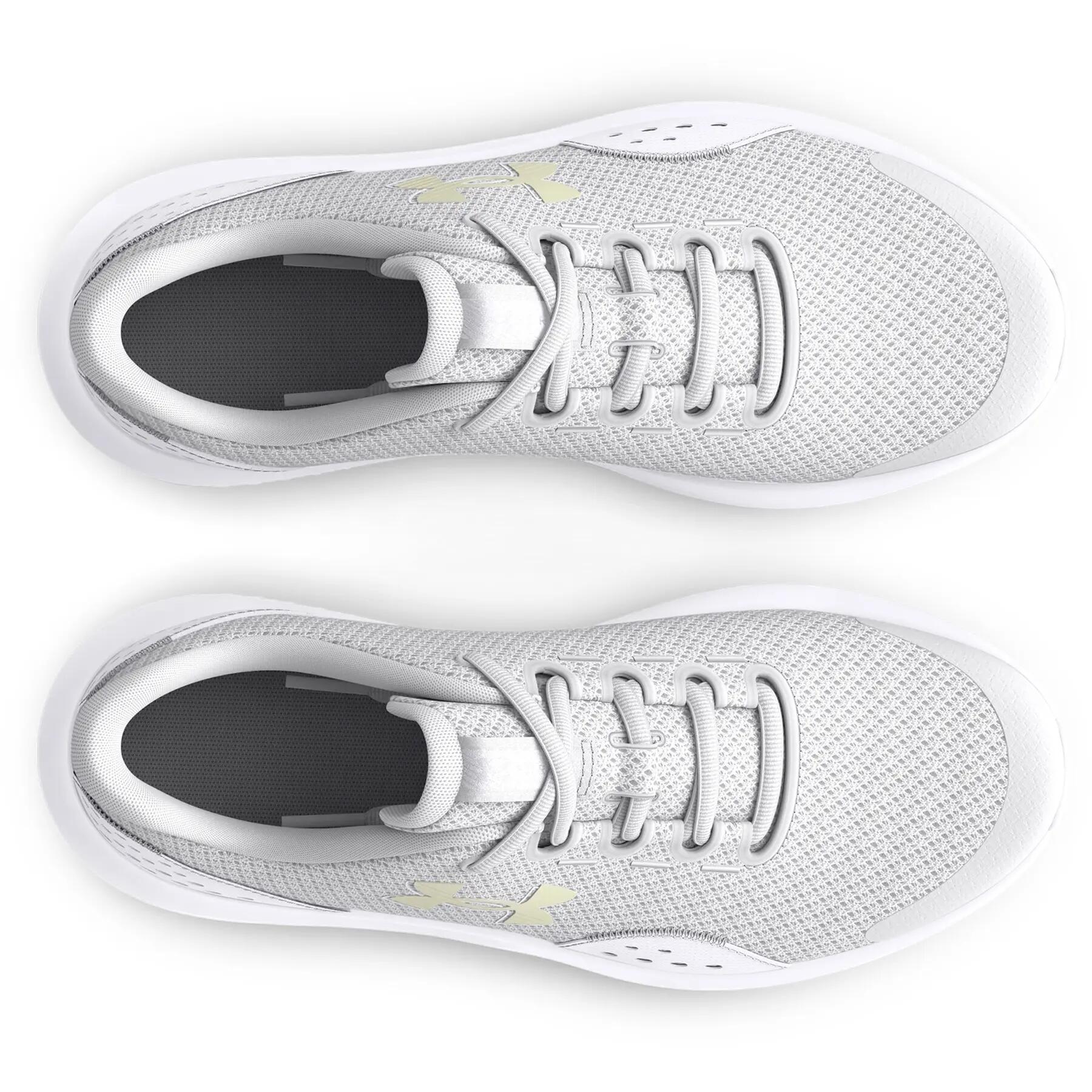 Sapatilhas de running para meninas do ensino fundamental Under Armour Surge 4 4/7
