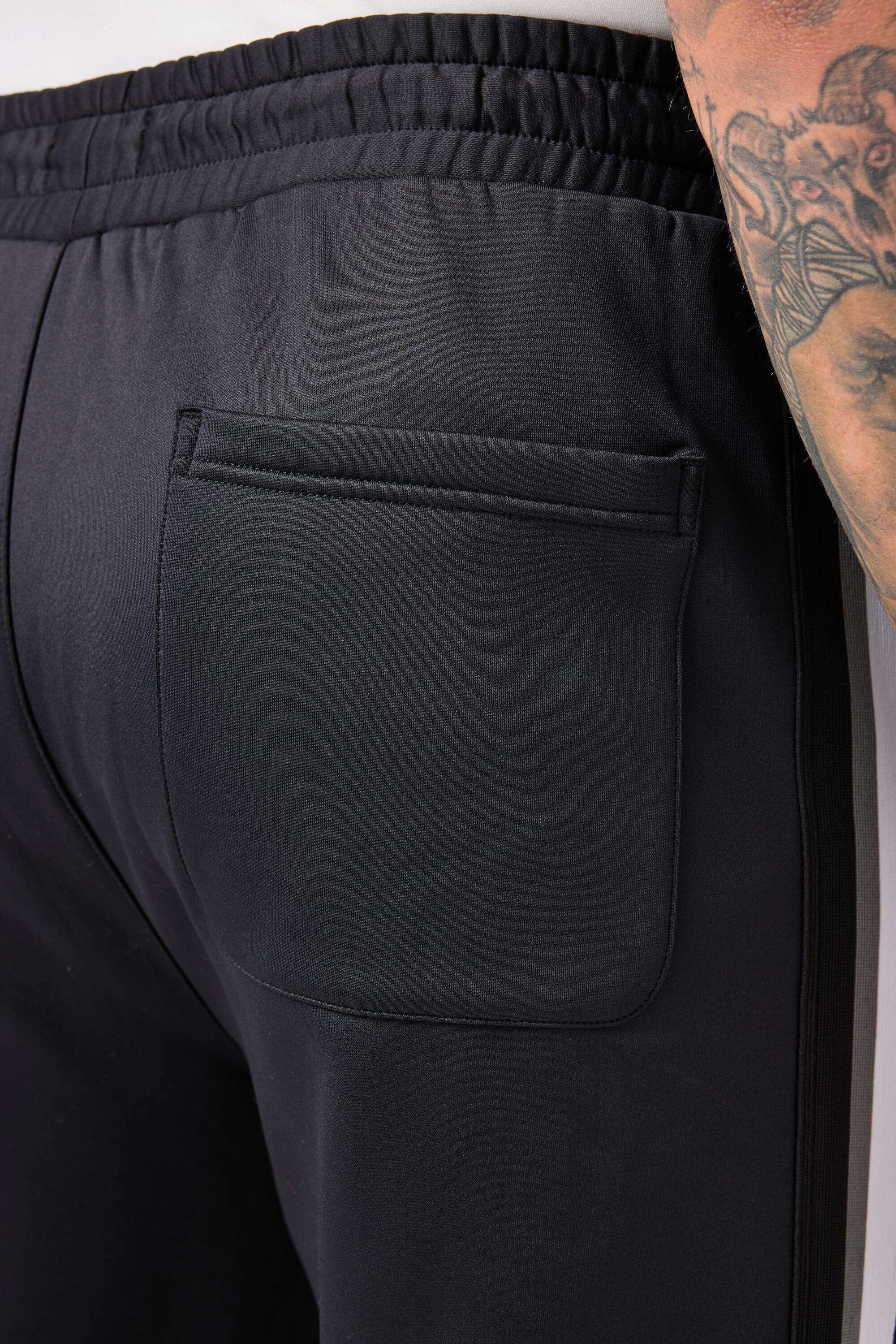 Hommes Pantalon de survêtement FLEXNAMIC® coupe Modern Fit collection Tennis 6/7
