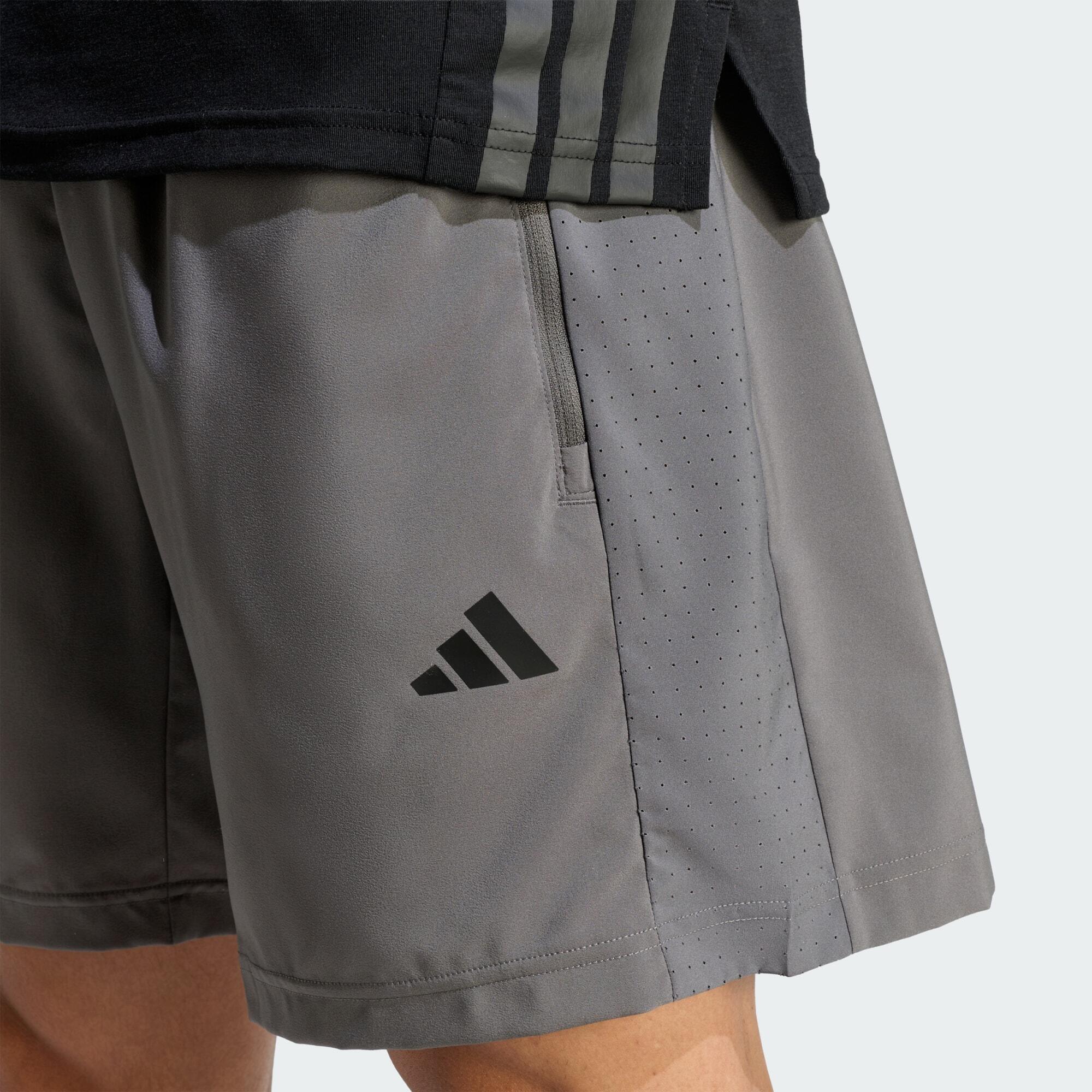 PANTALÓN CORTO TÉCNICO DE ENTRENAMIENTO ESSENTIALS BASE 4/5