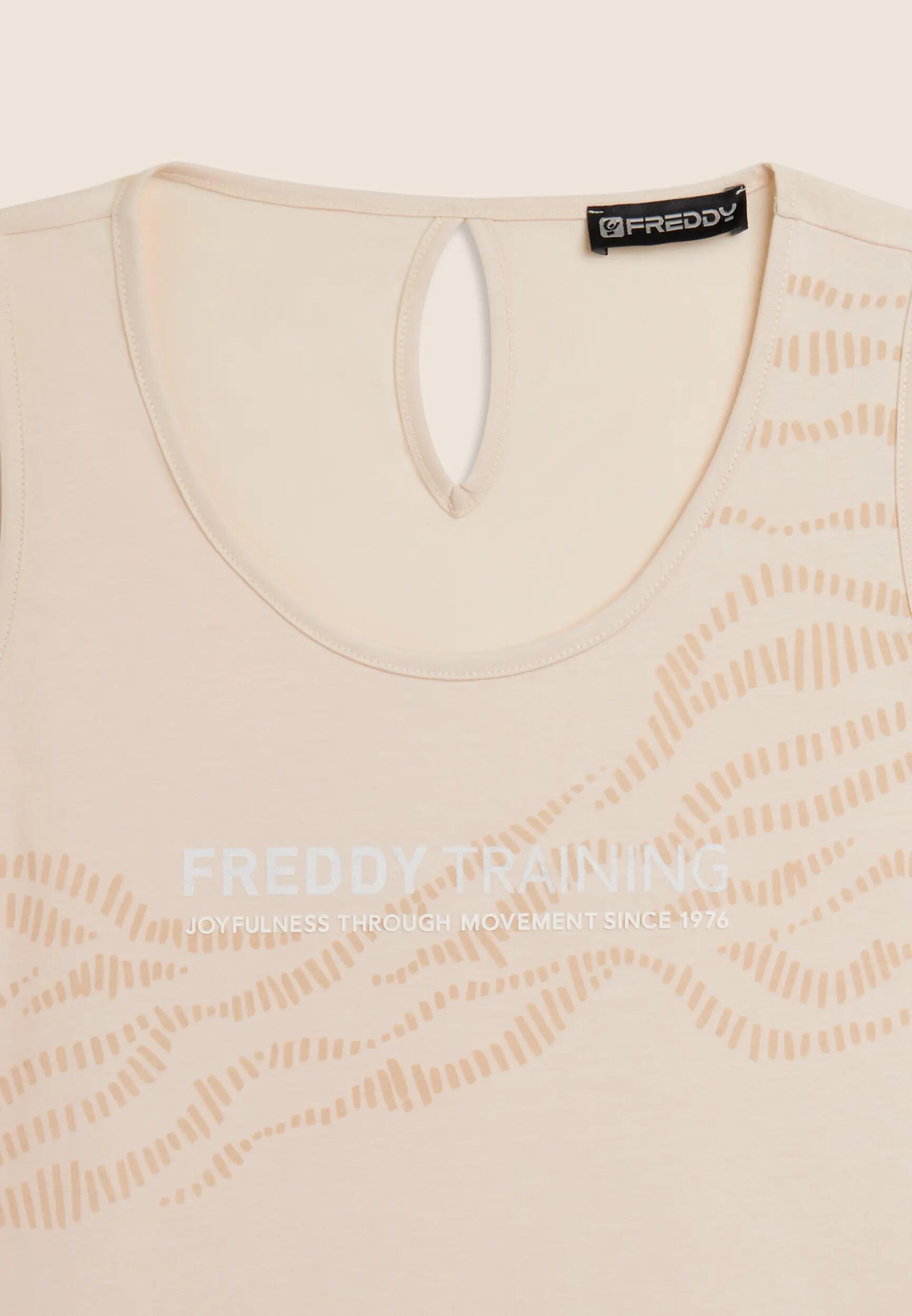 Camiseta sin mangas con detalles recortados y gráfico FREDDY 7/7