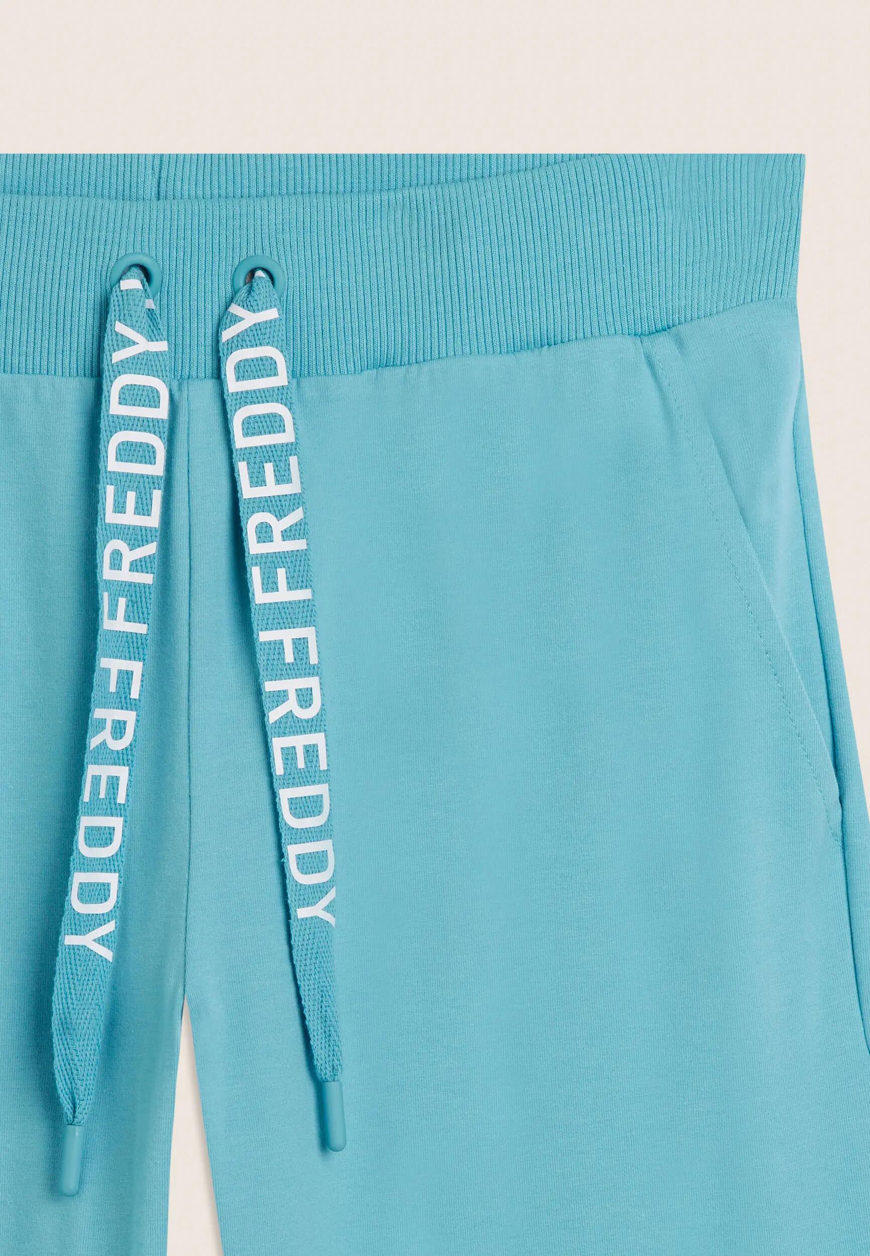 Pantalon style corsaire avec bas arrondi et logo FREDDY 6/6