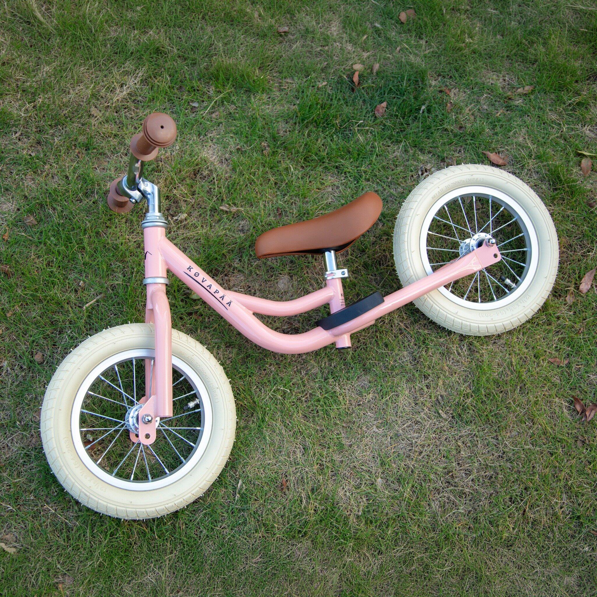 Verschillen tussen een driewieler met duwstang en een kinderfiets 3 jaar - Verschillen tussen