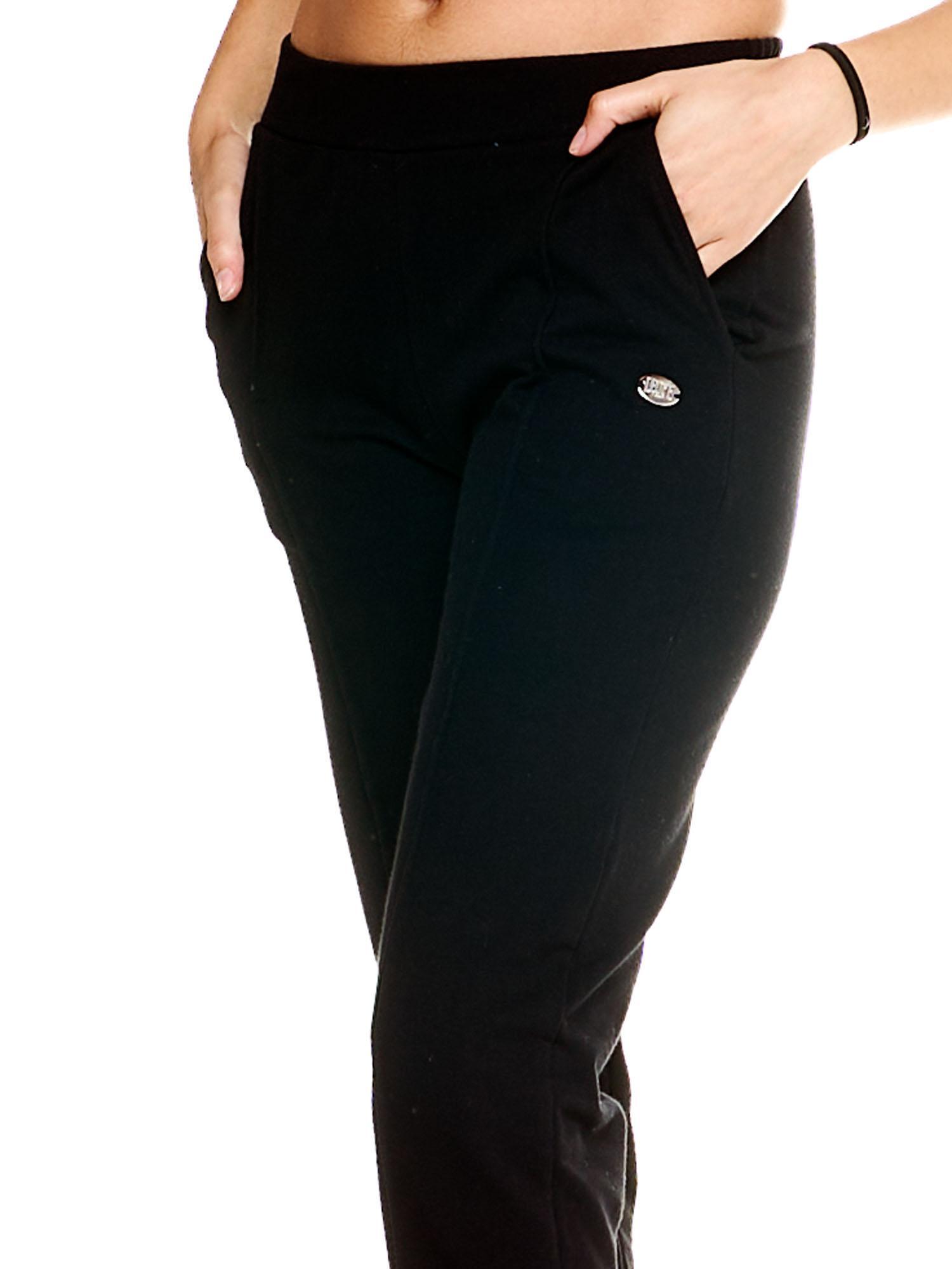 Pantaloni da tuta Leone donna con cuciture verticali Basic 5/8