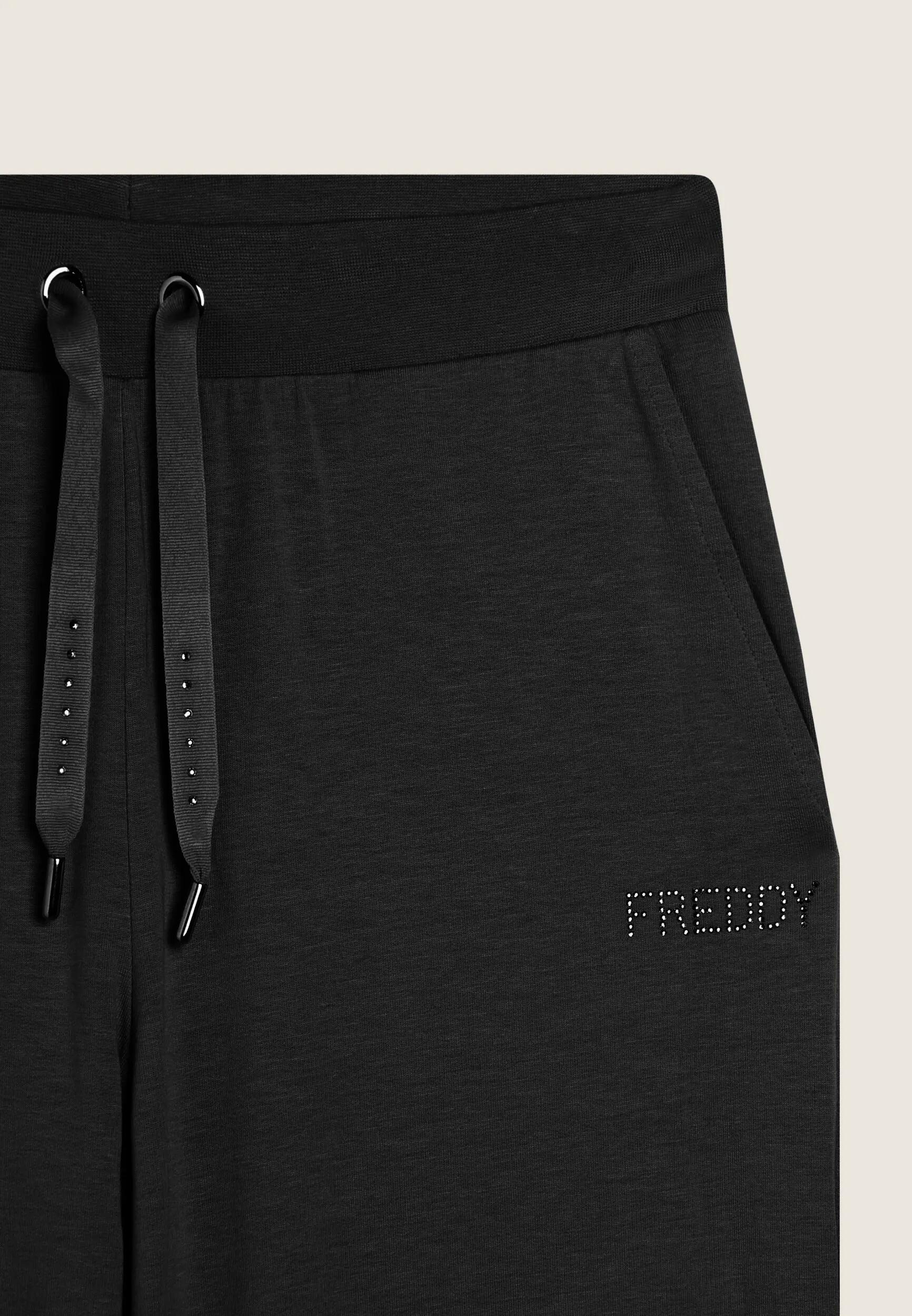 Pantalón deportivo con pernera ancha y strass 3/3