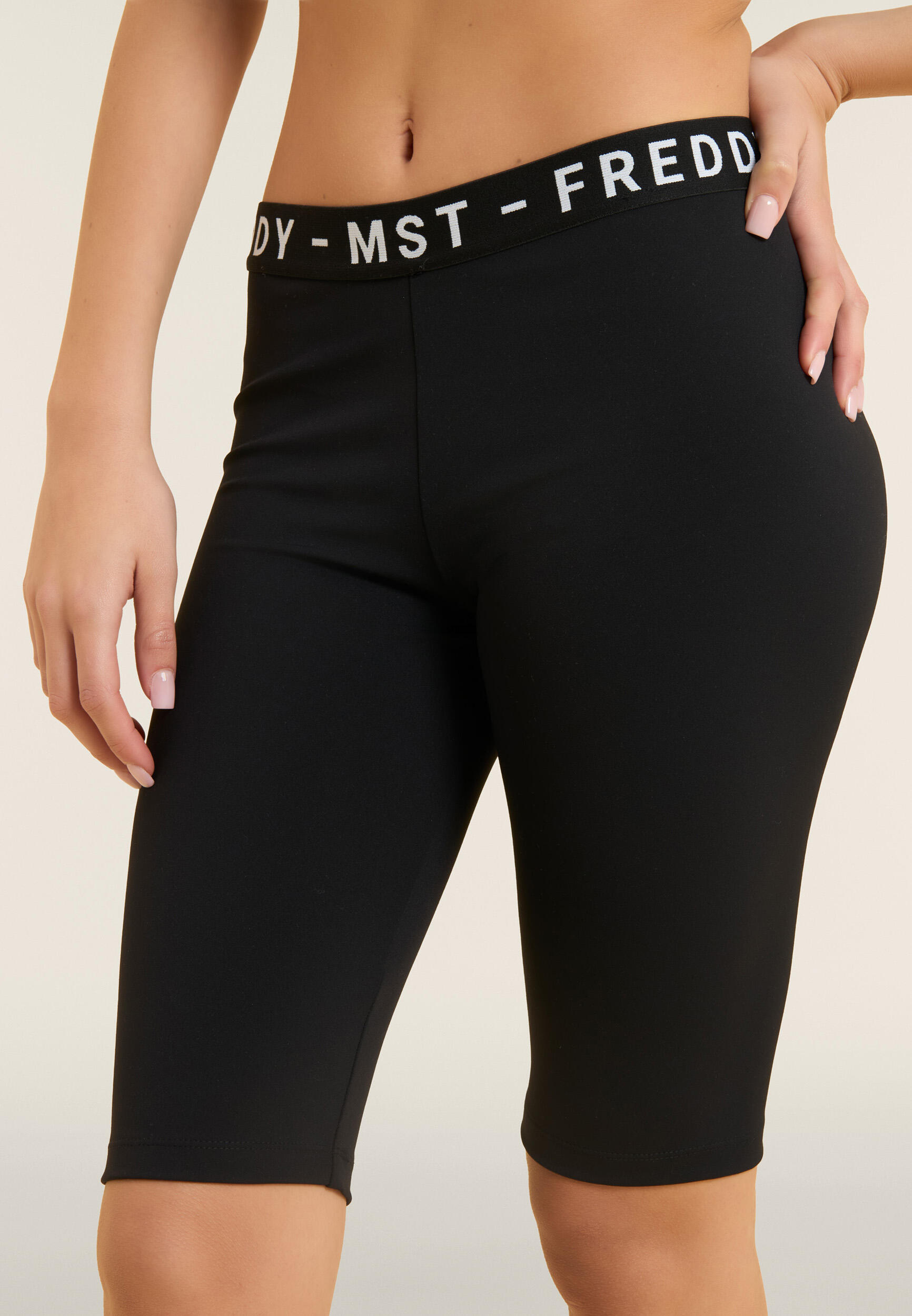 Leggings ciclista con tira elástica FREDDY MST 4/5