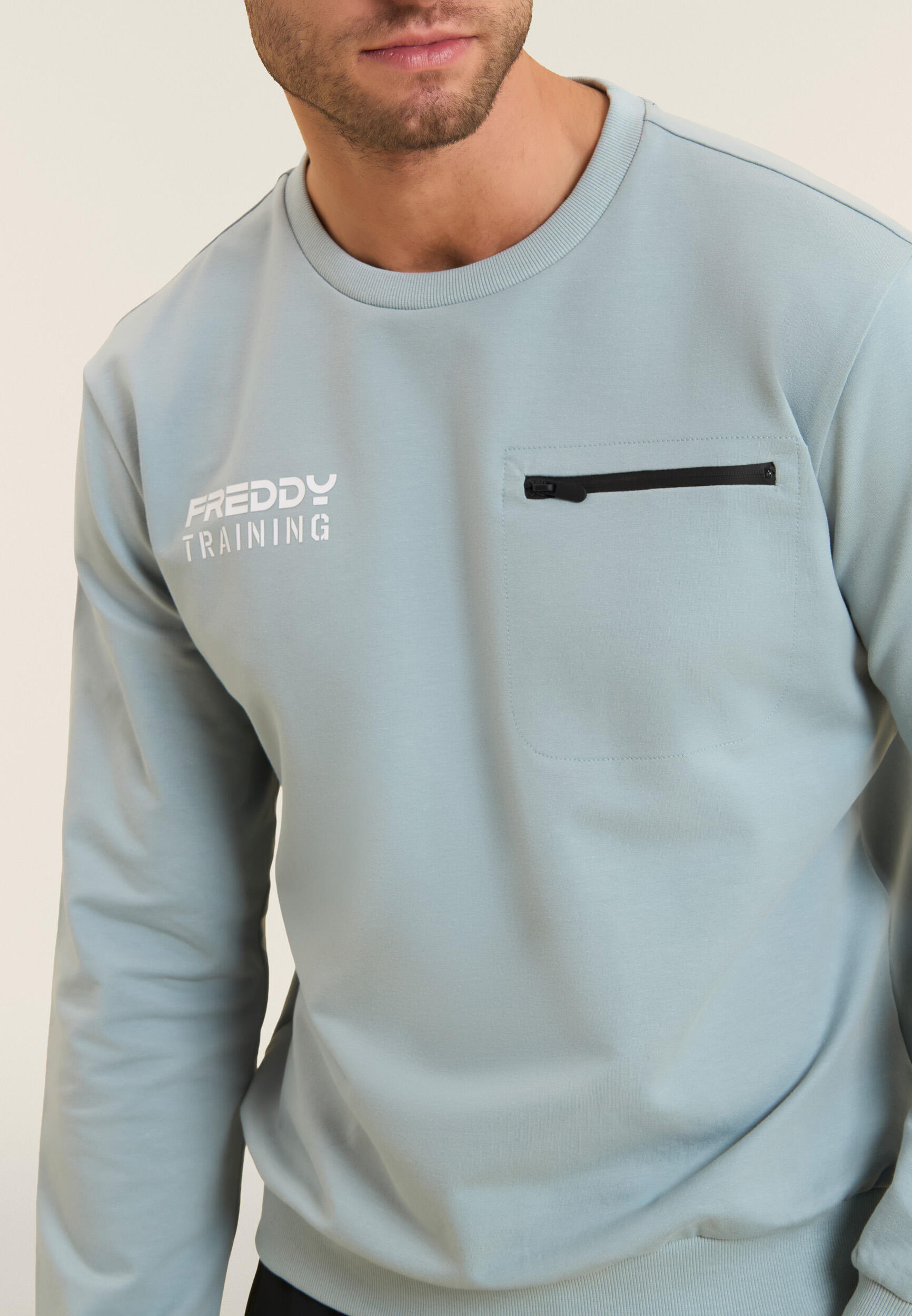 Felpa girocollo in baby french terry con taschino zip 4/4
