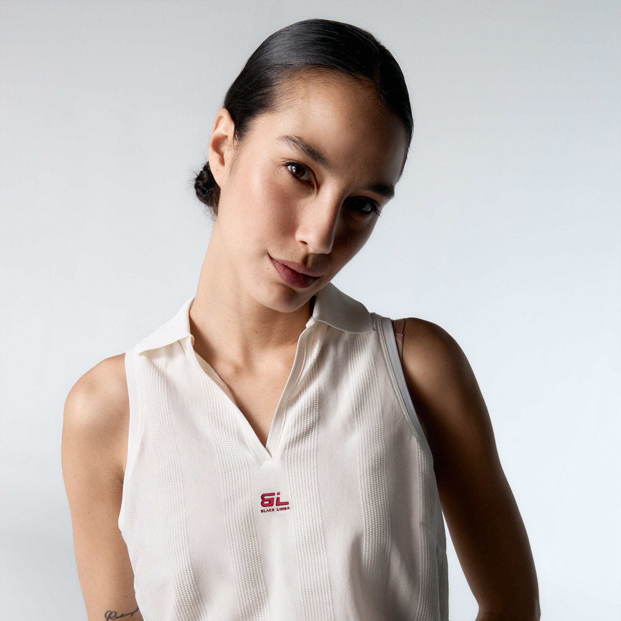 Camiseta polo sin mangas Betty Sujeción baja de mujer Black Limba Cream 1/5