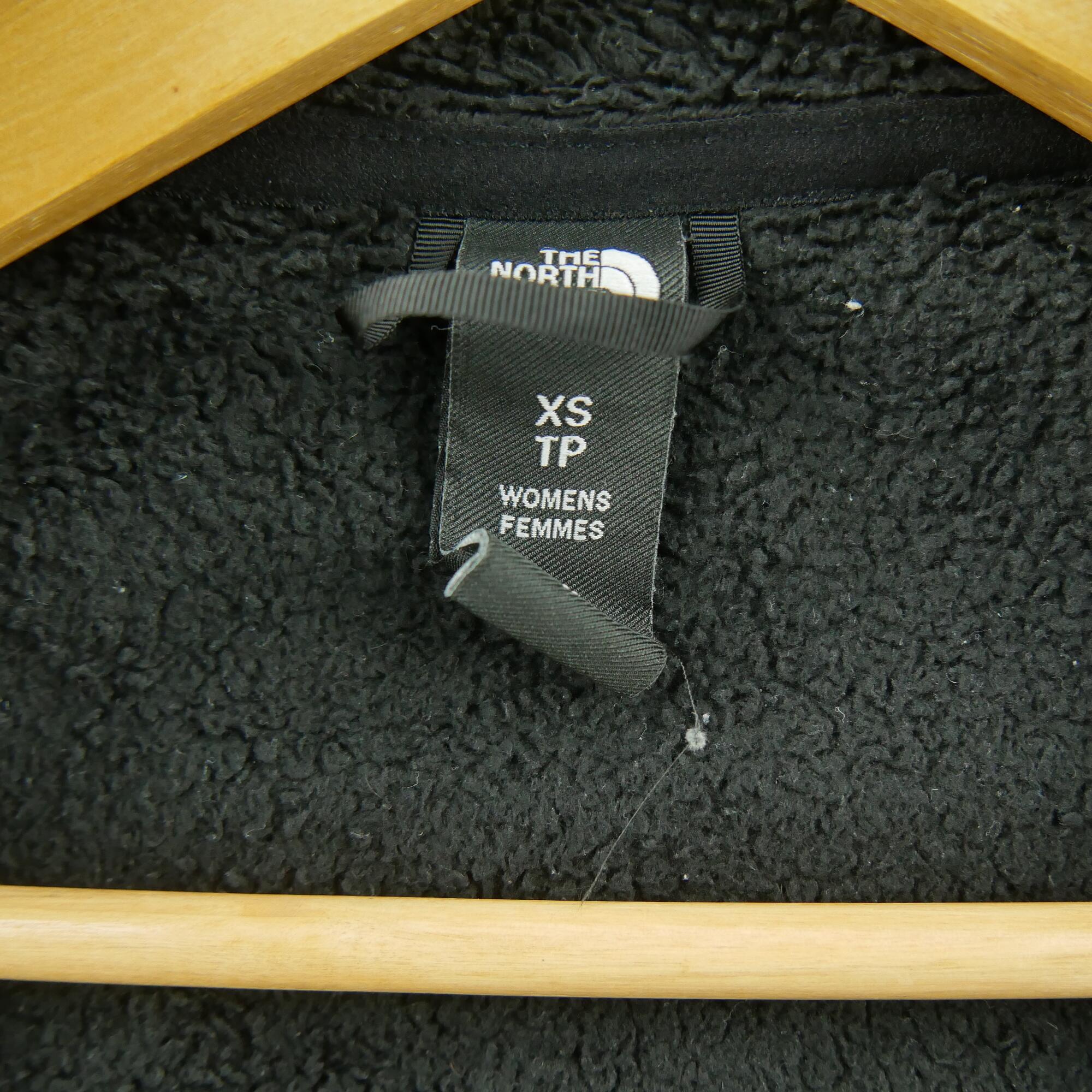 Seconda Mano - Giacca in pile nero TNF Osito da donna - Stato eccellente 6/7