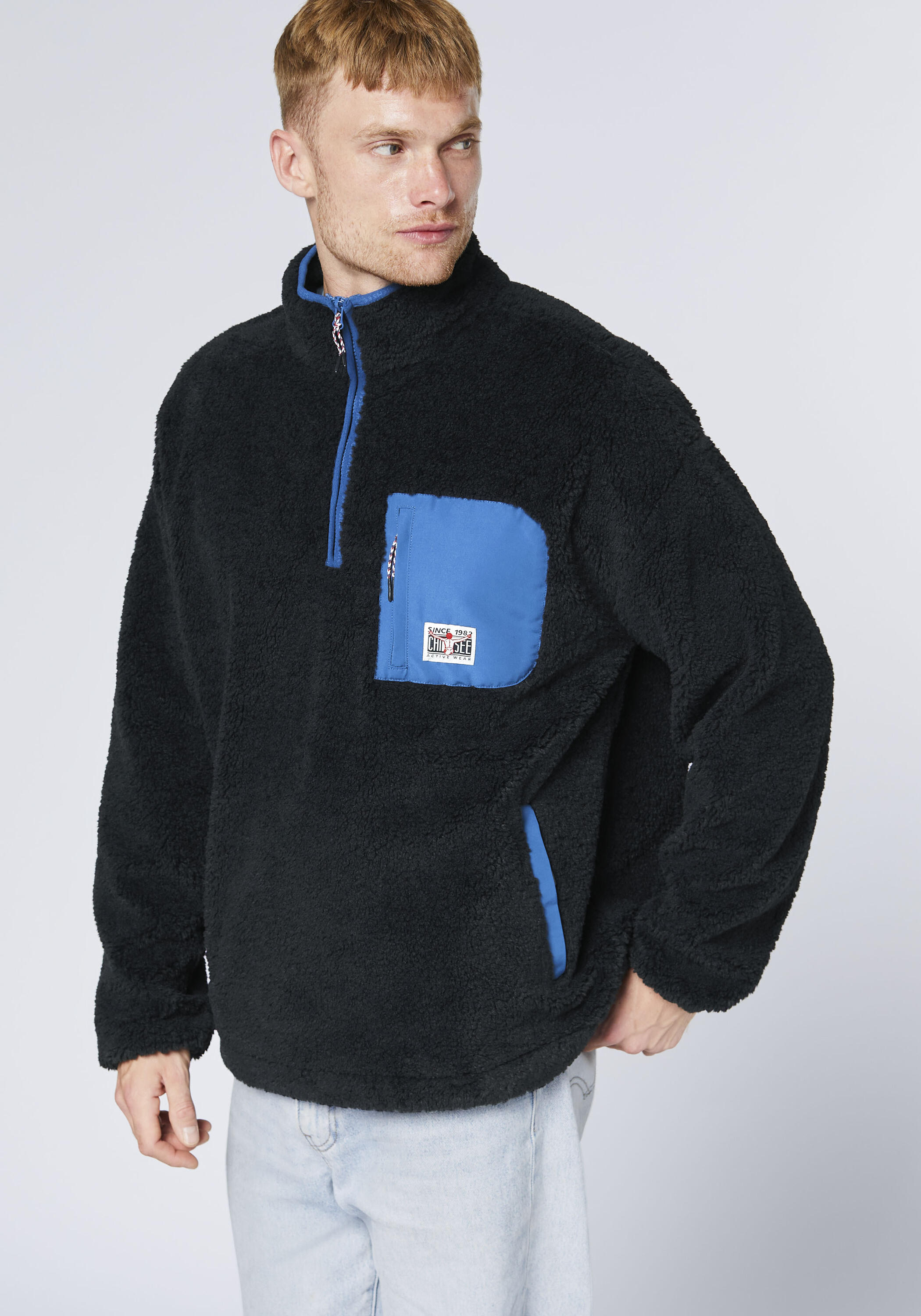 Fleecepullover mit Stehkragen und kurzem Reißverschluss 6/7