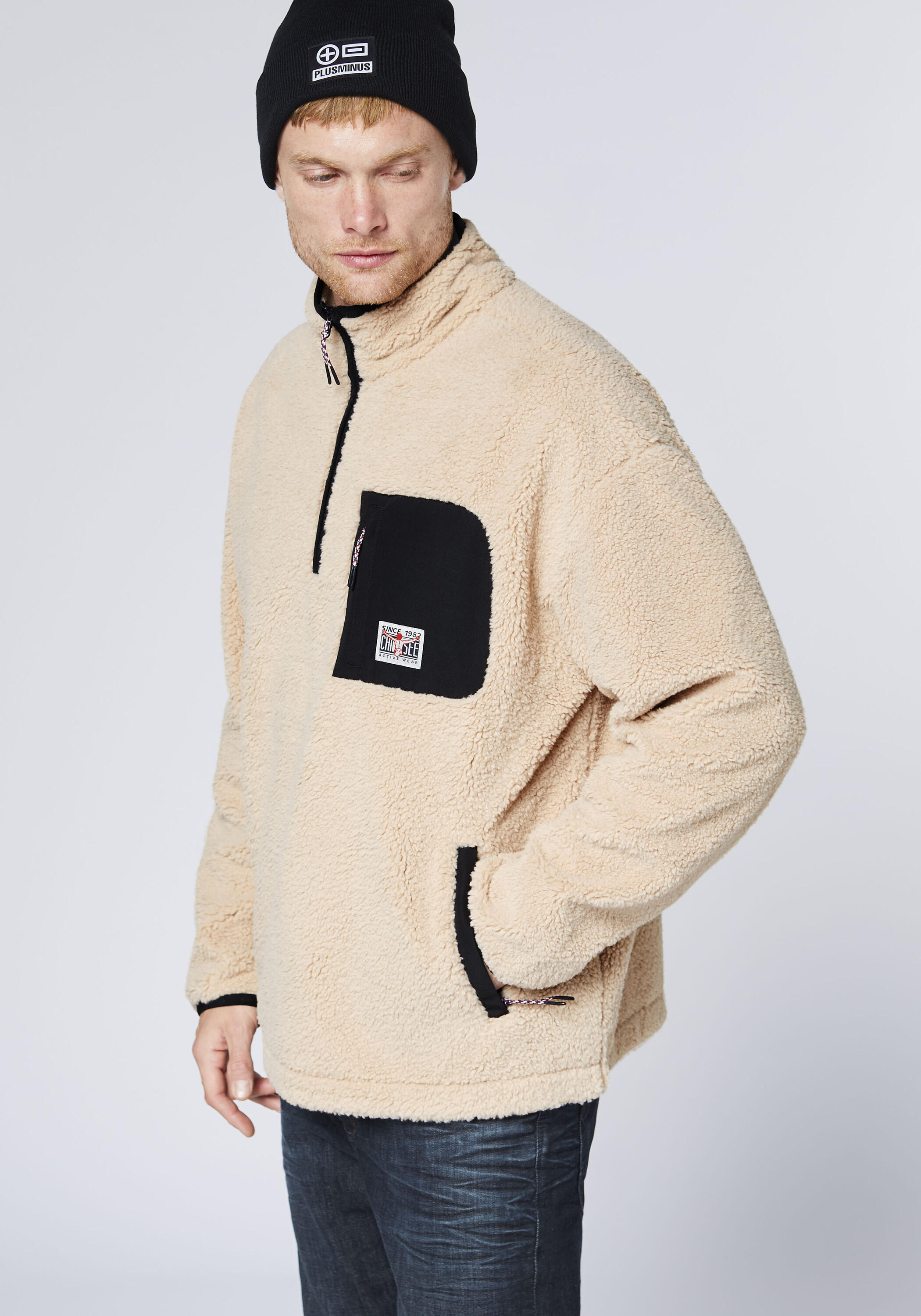 Fleecepullover mit Stehkragen und kurzem Reißverschluss 6/7