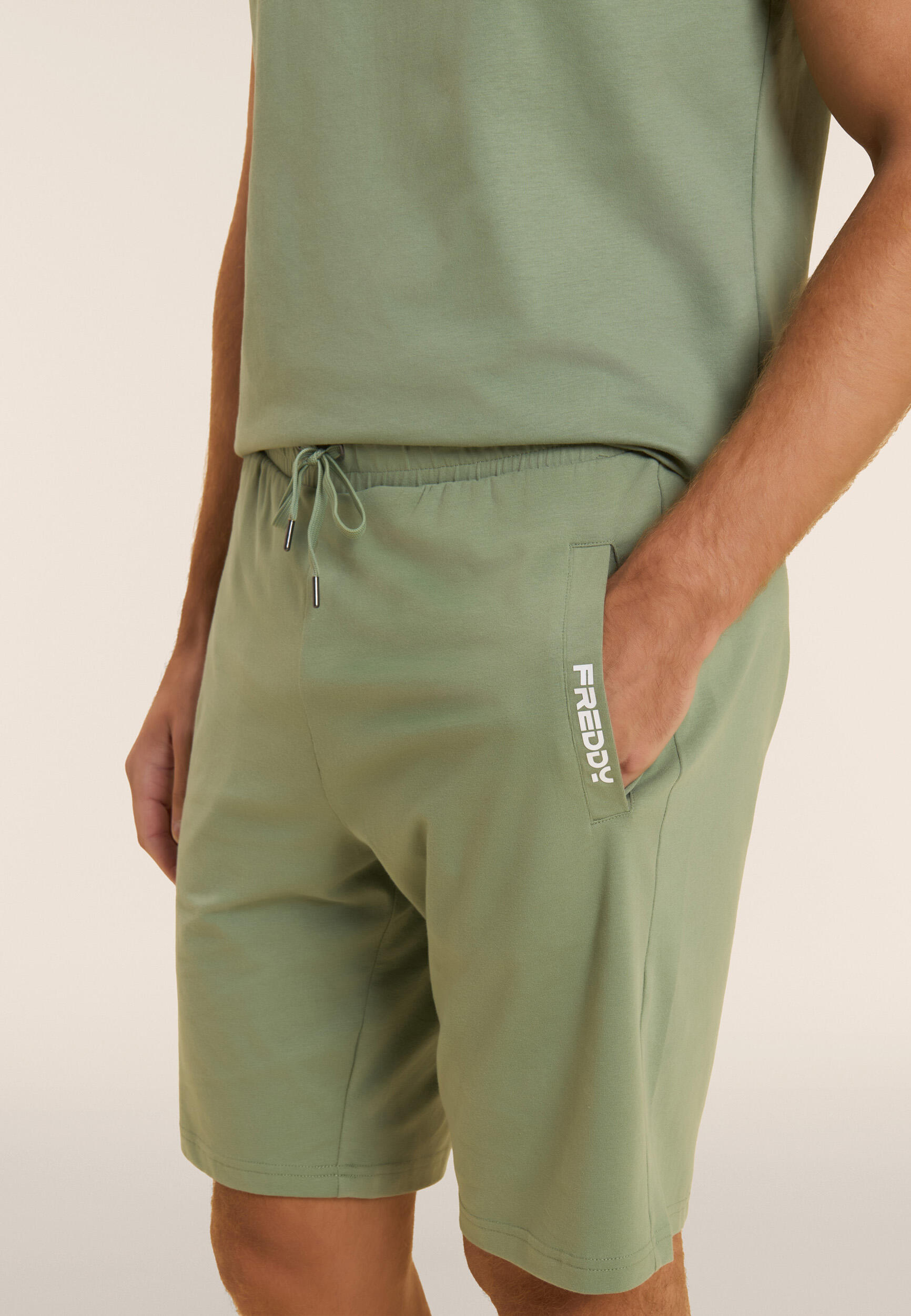 Pantalon court en jersey élastique avec poche 4/5