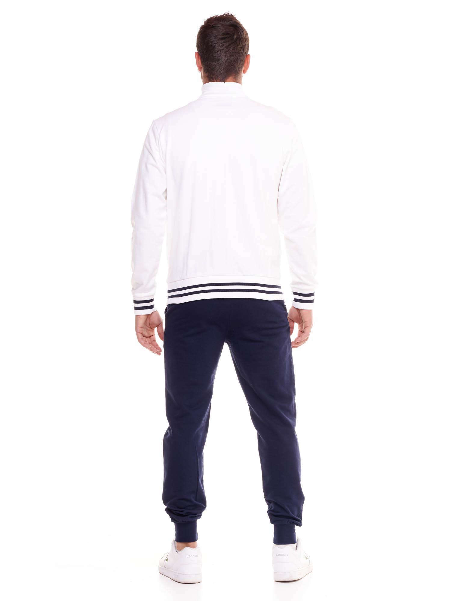 Conjunto de treino masculino Welcome Back com gola alta e fecho de correr. 5/8