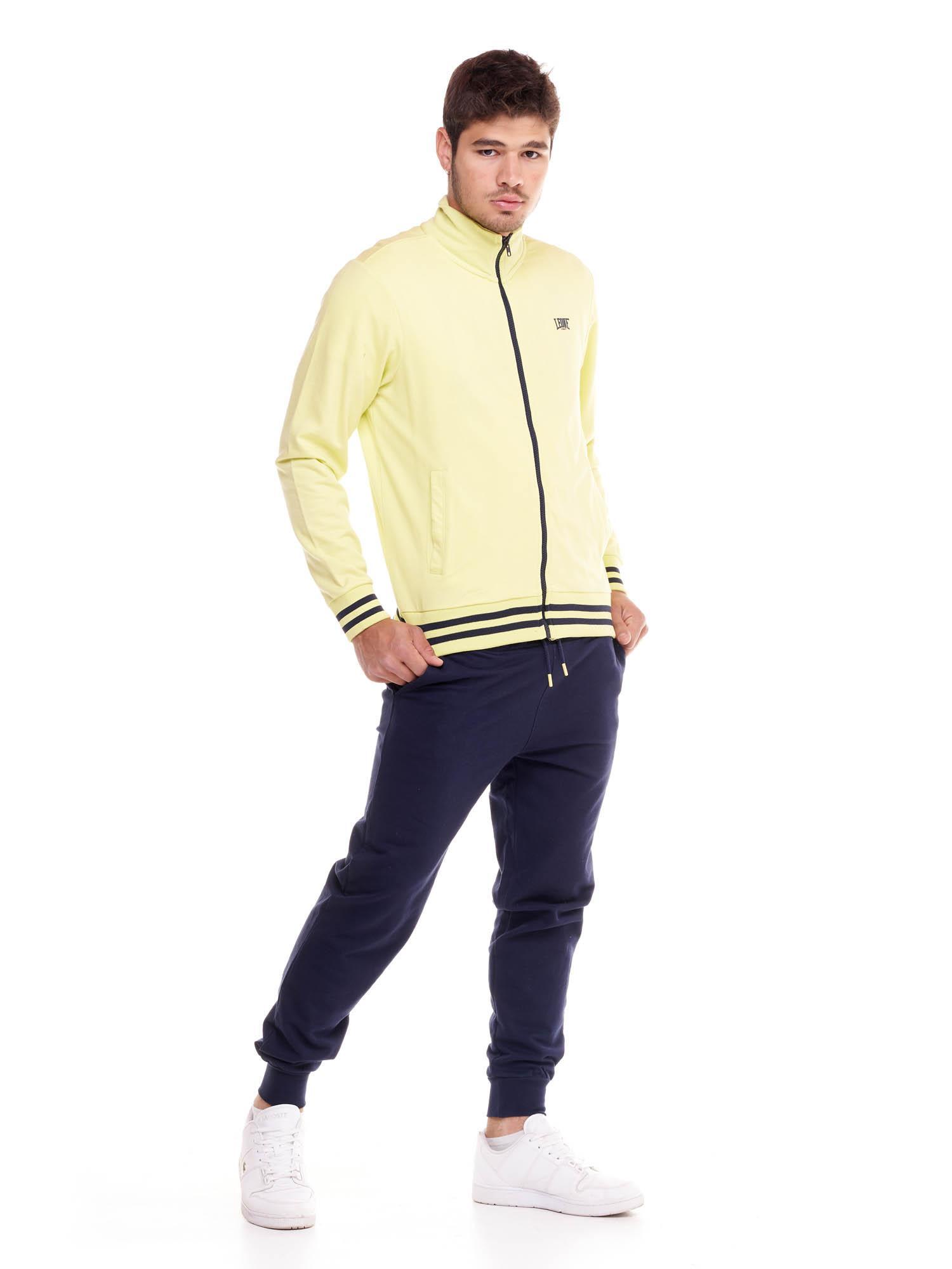 Conjunto de treino masculino Welcome Back com gola alta e fecho de correr. 3/8