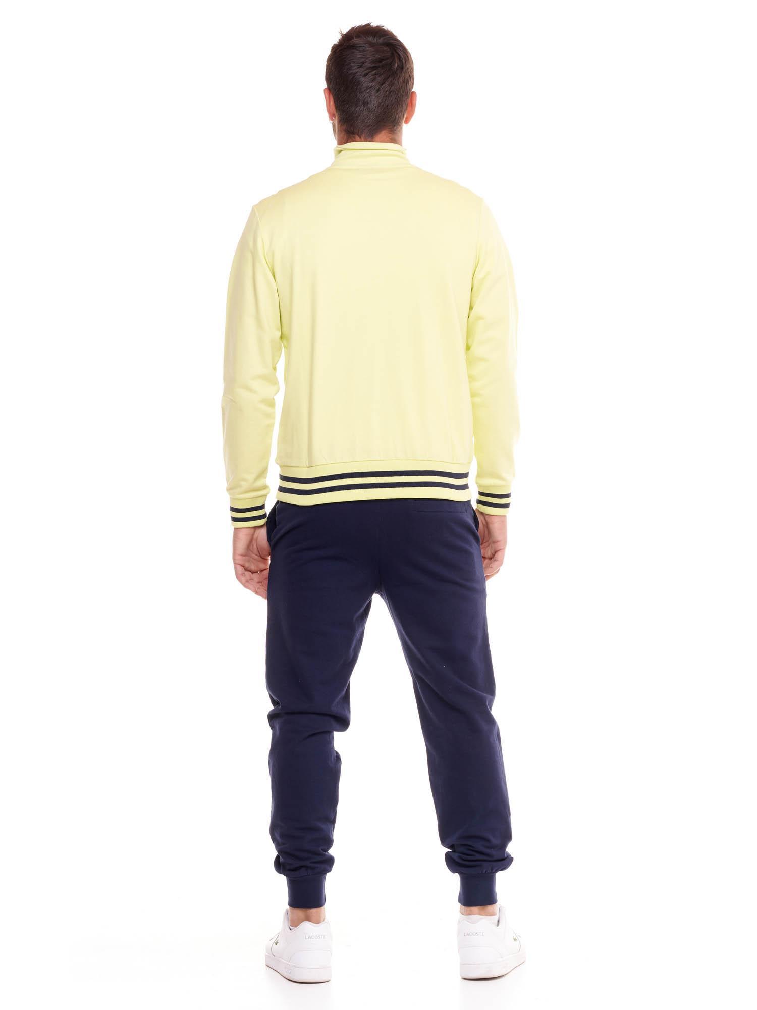Conjunto de treino masculino Welcome Back com gola alta e fecho de correr. 5/8