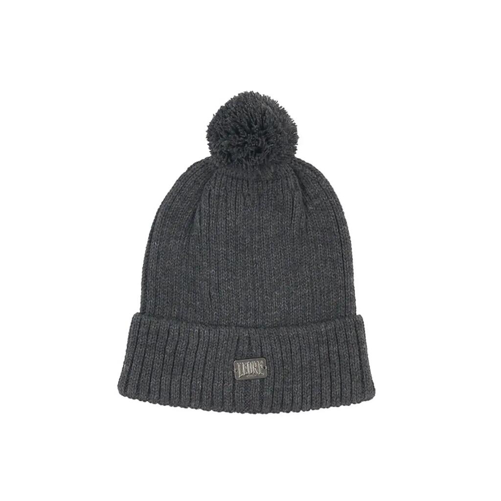 Woman caps Pompon