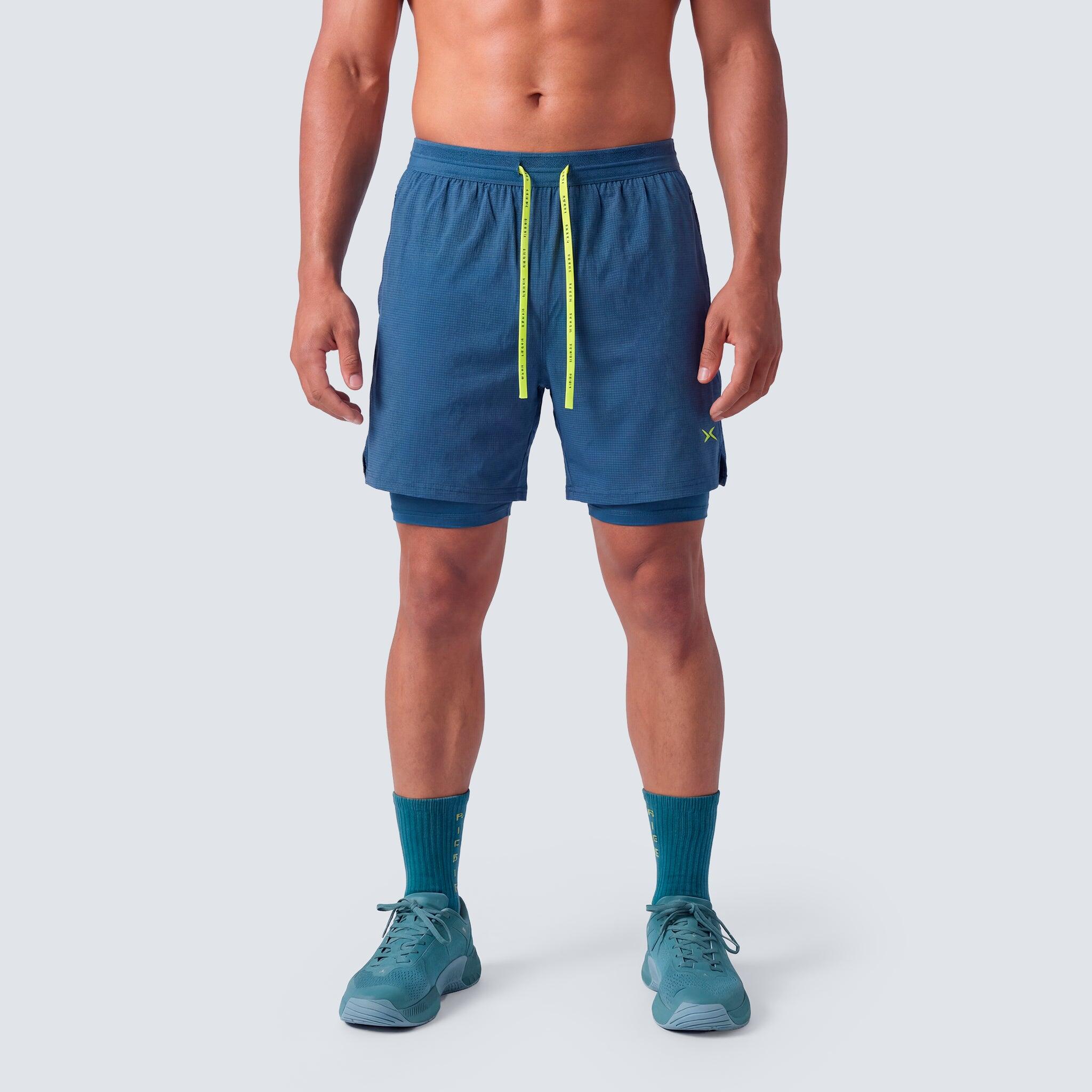 Short 2-en-1 Performance Homme SS26 1/5