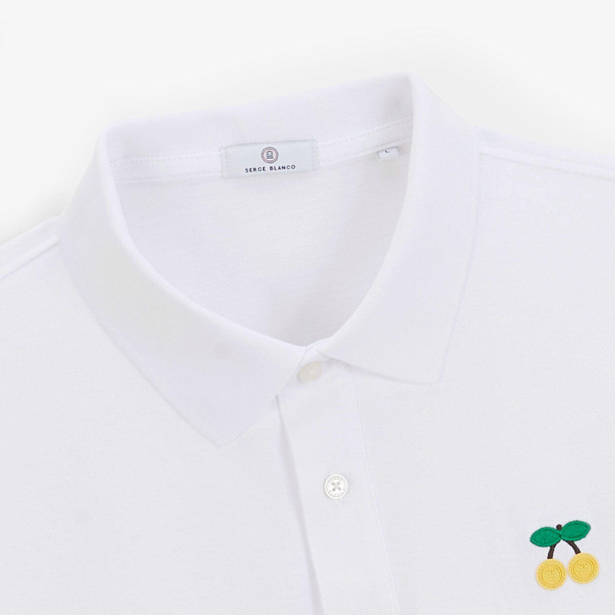 Polo a maniche corte con ricamo ciliegie gialle 4/6