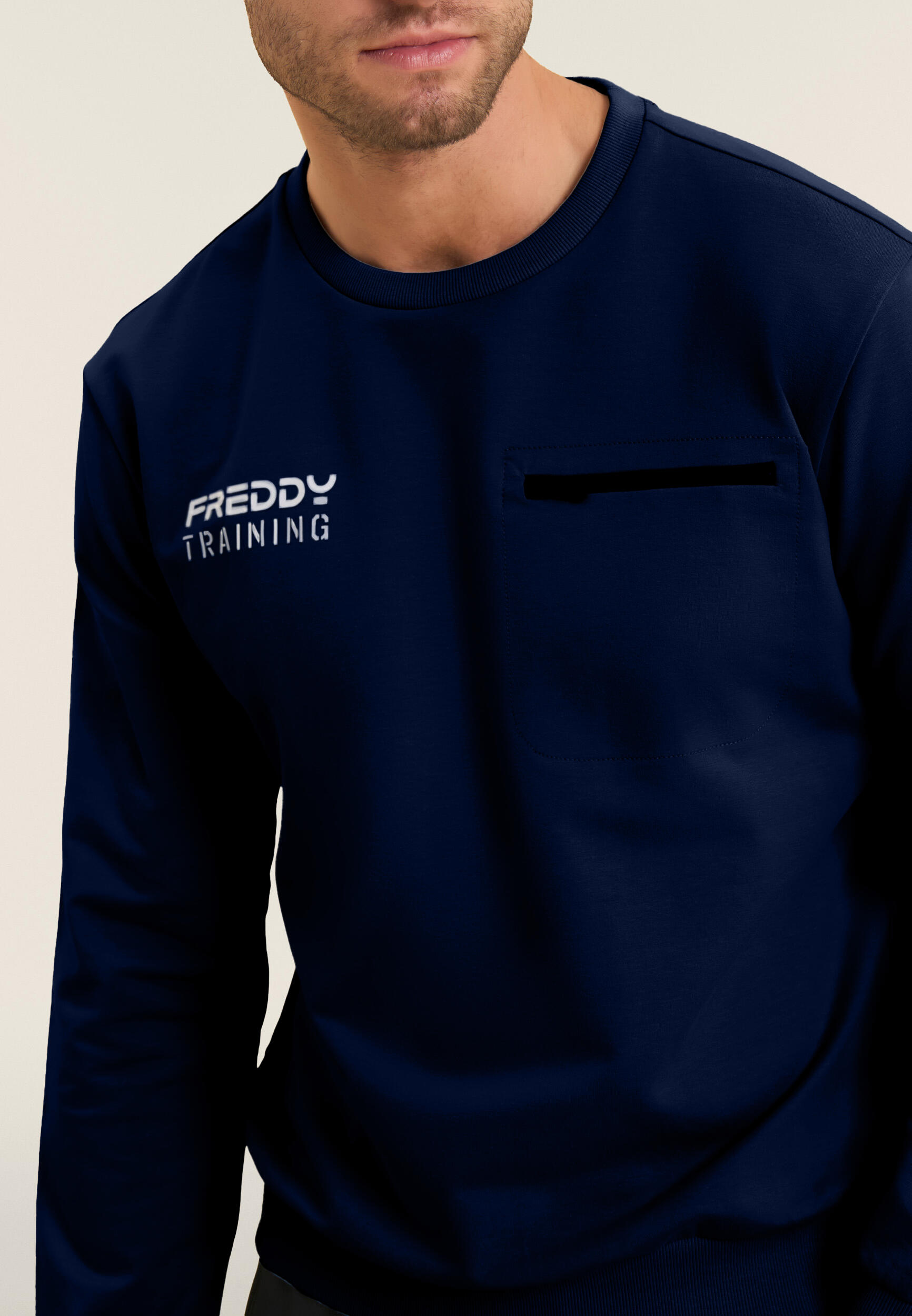 Felpa girocollo in baby french terry con taschino zip 4/4