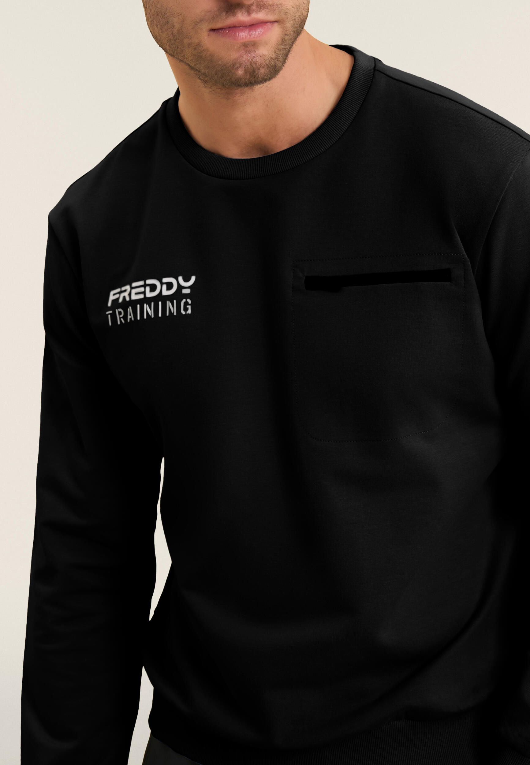 Felpa girocollo in baby french terry con taschino zip 4/4
