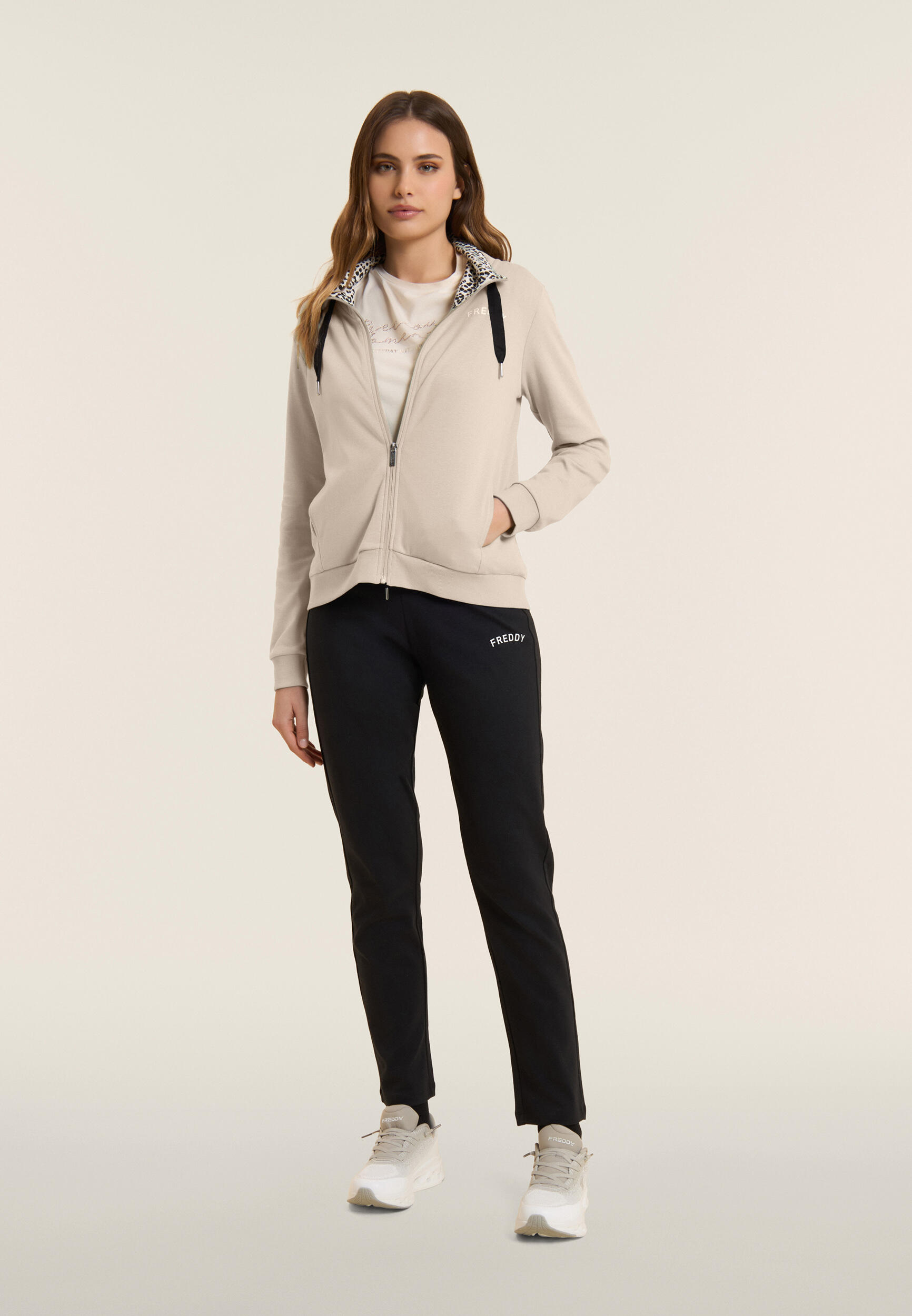 Tuta con zip e collo alto con interno animalier 2/5