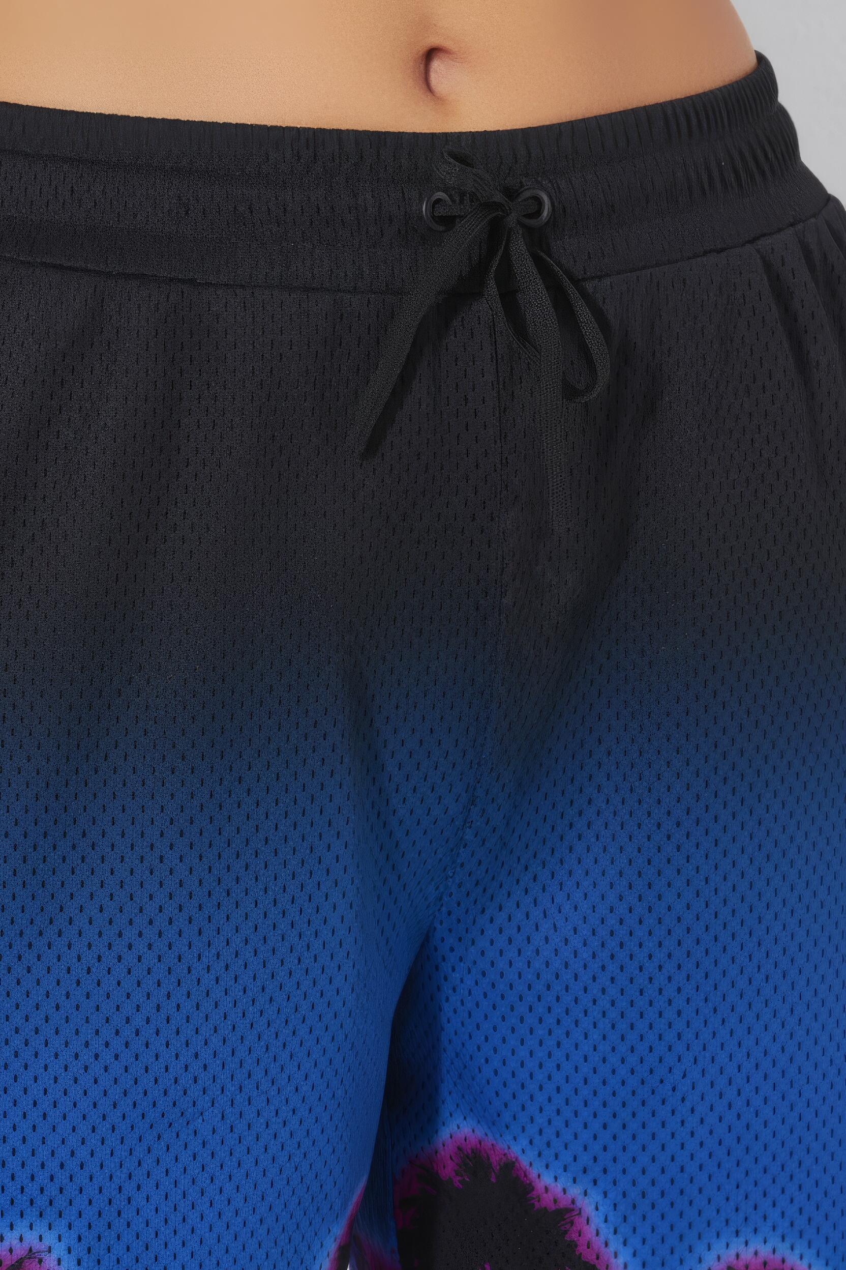 Femme Short technique jambe large et taille élastique bordure motif palmiers 4/7
