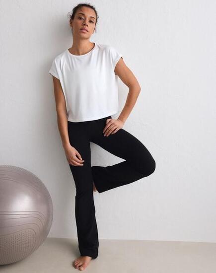 Damen Leggings mit Schlag Mittlere Taille Feuchtigkeitsableitend Schwarz