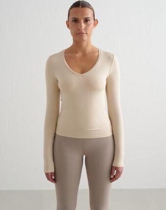 Damen Langarmshirt mit V-Ausschnitt Weich Feuchtigkeitsableitend Creme