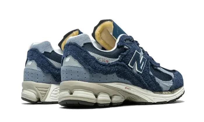 New Balance 2002R Protection Pack Navy Grey 3/4