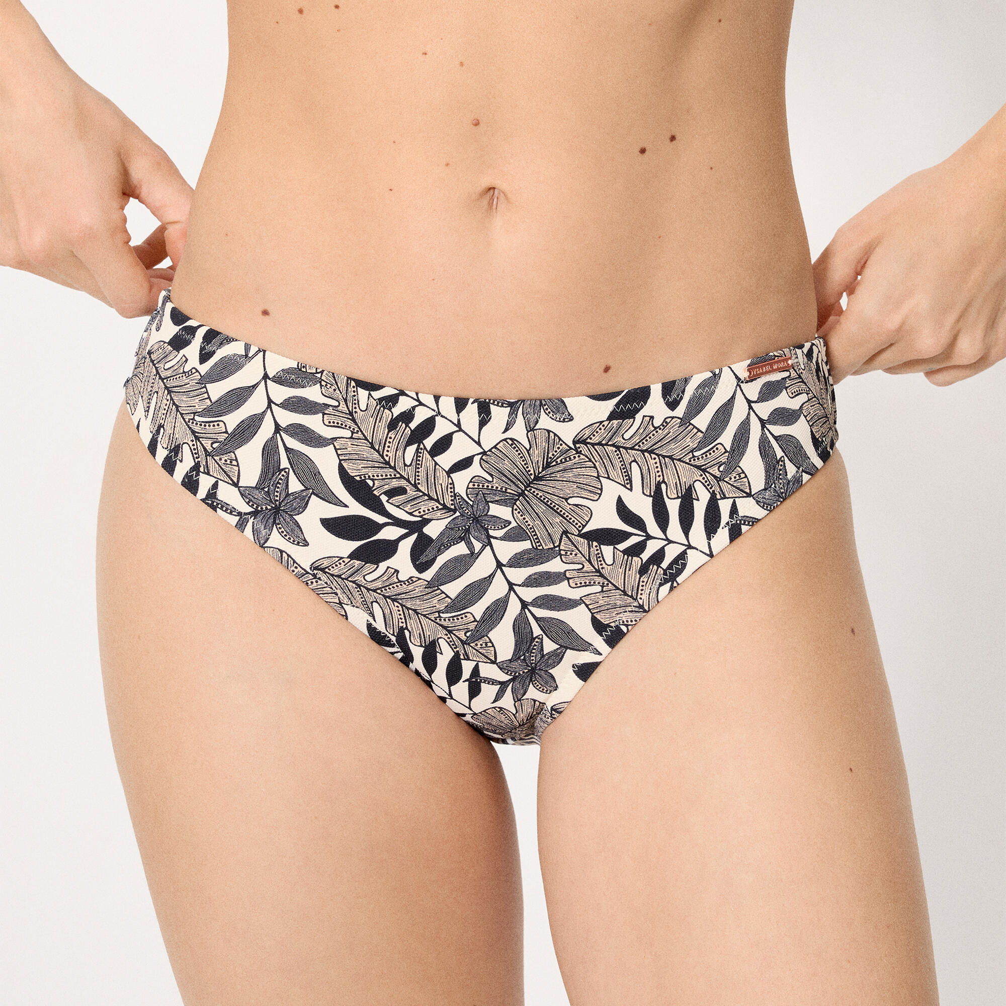 Culotte de bikini noire en micropiqué à motif de feuilles 1/4