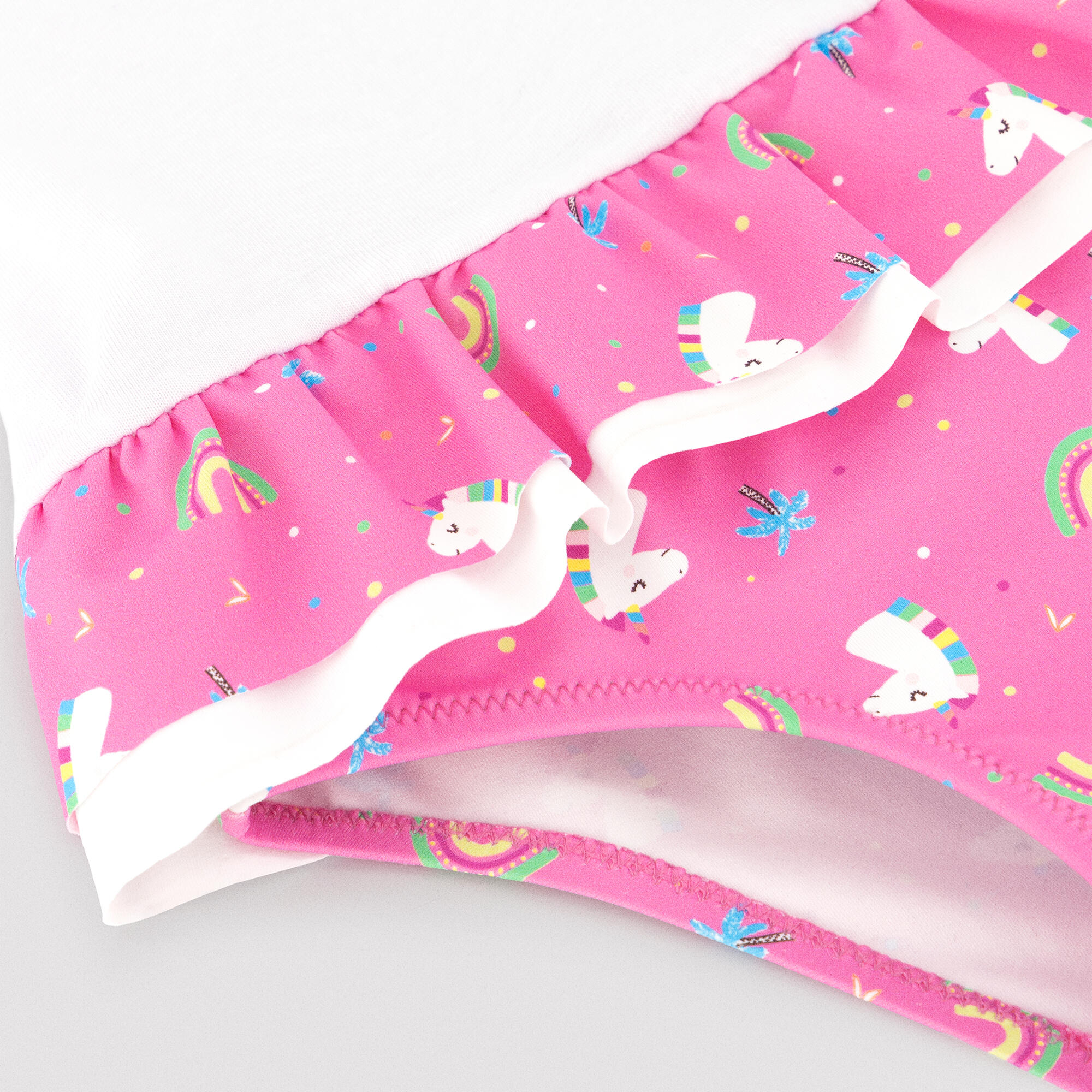 Conjunto bebé camiseta y braguita baño detalles  volantes y lazos estampado unic 2/3