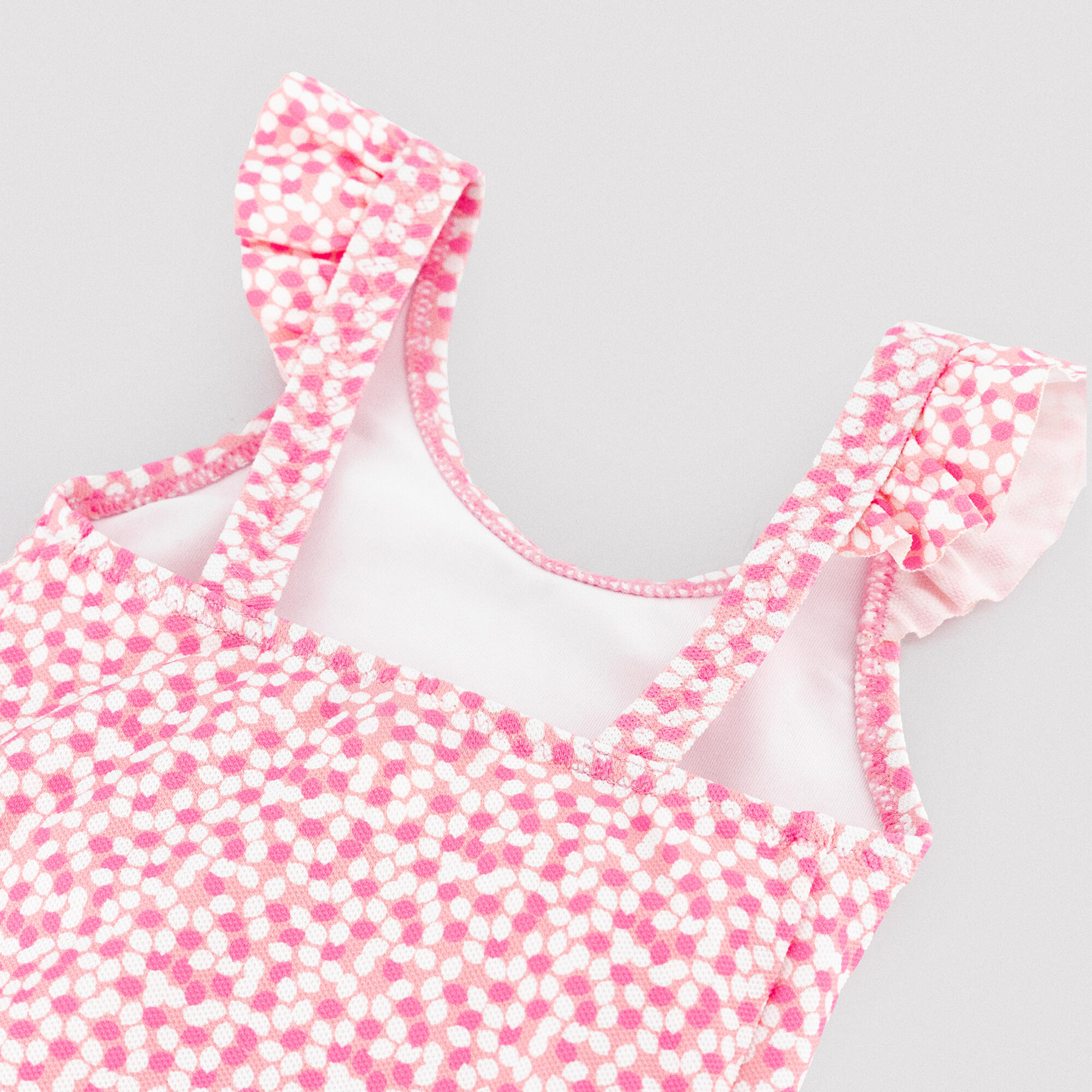 Bañador bebé niña detalles volantes estampado flores rosa 3/4