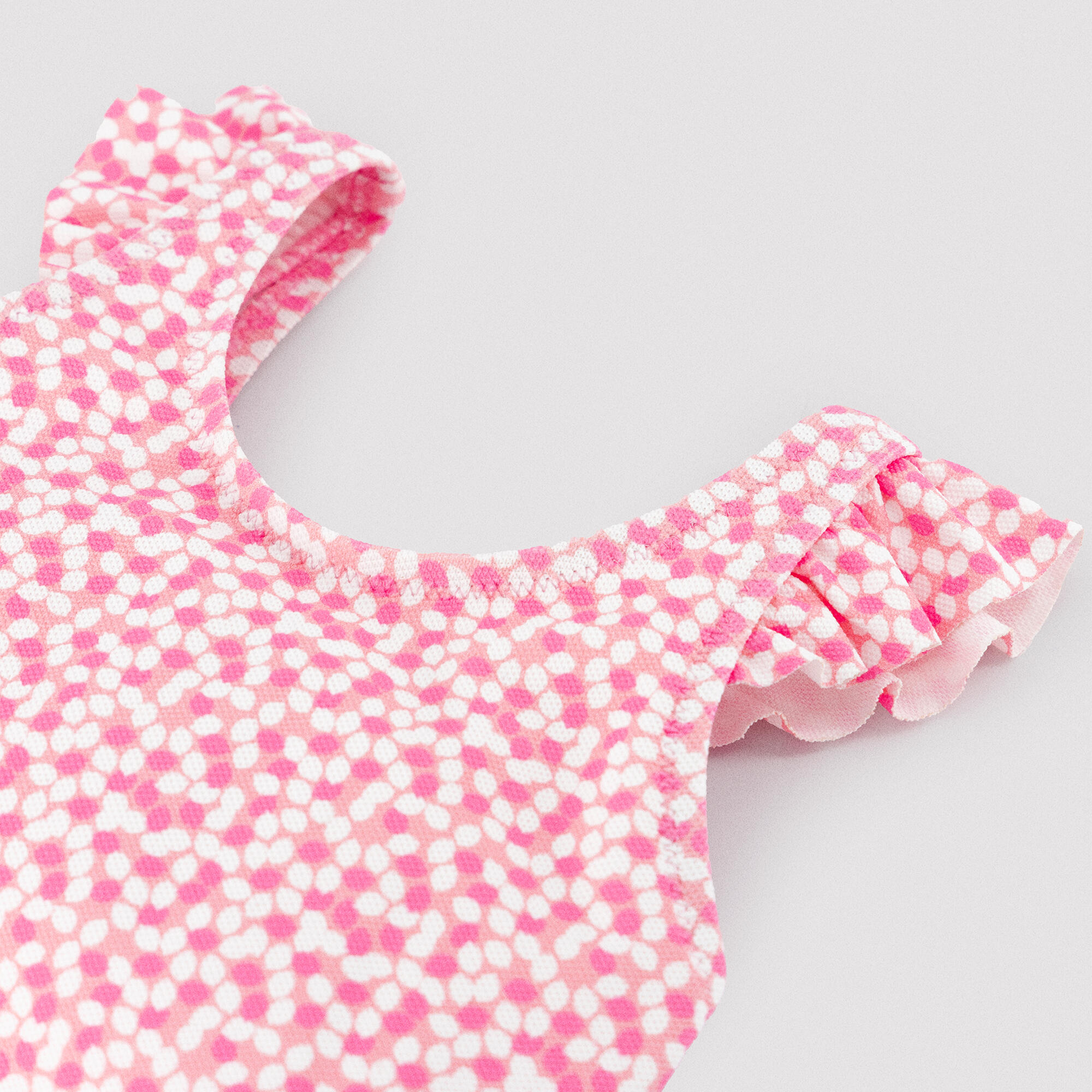 Bañador bebé niña detalles volantes estampado flores rosa 2/4
