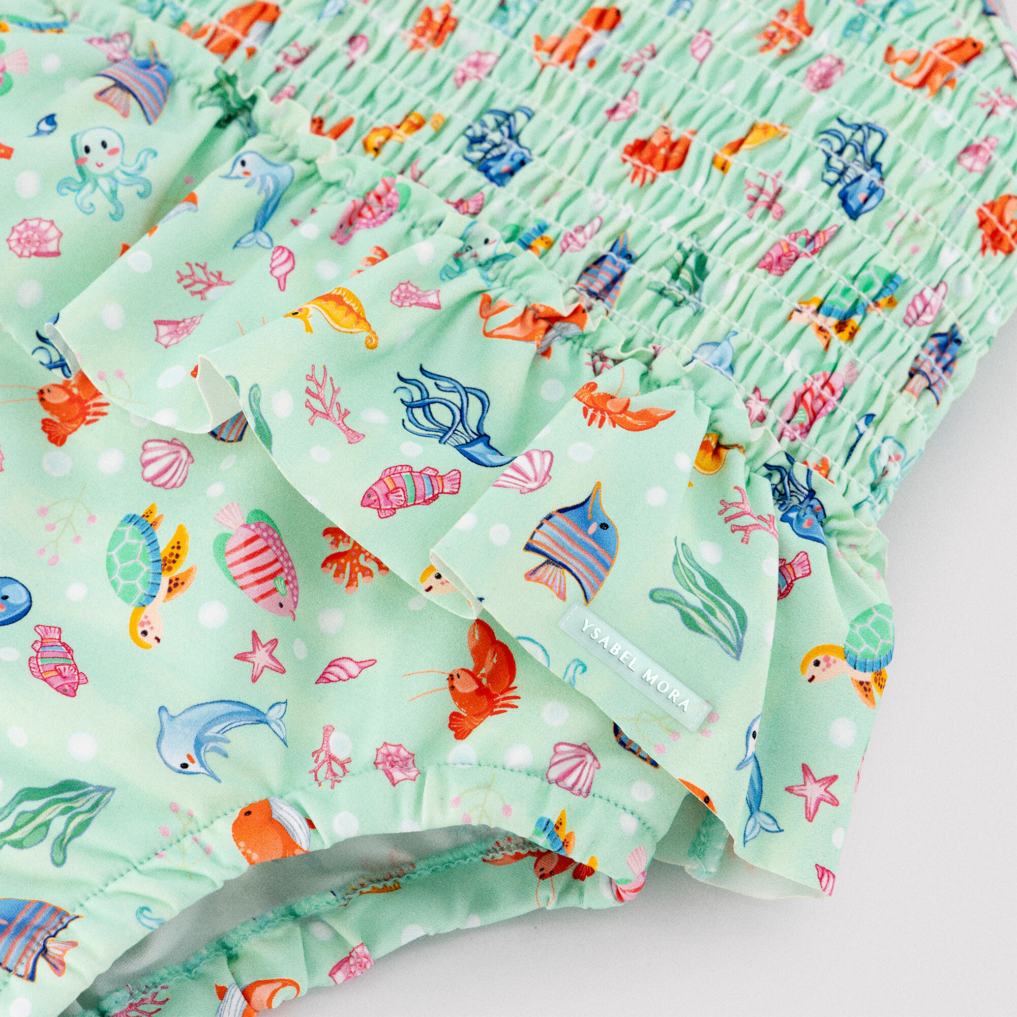 Maillot de bain bébé fille à volants et imprimé nid d'abeille à motifs de faune 2/3
