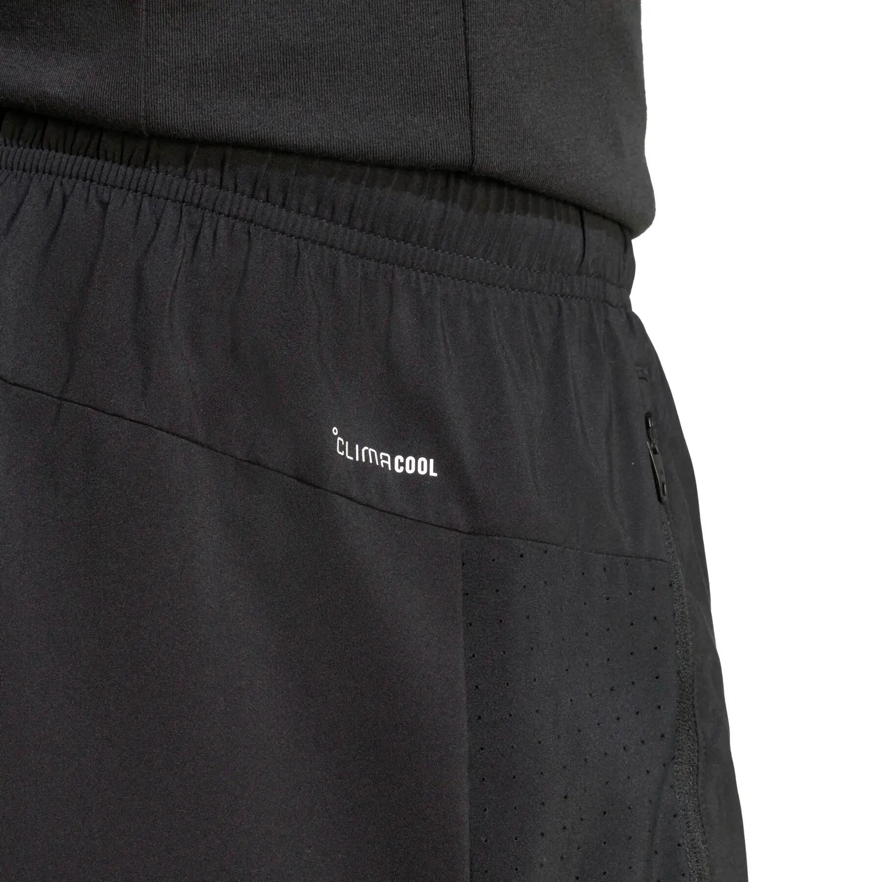 WORKOUT ESSENTIALS BASE WOVEN SHORT 7/8