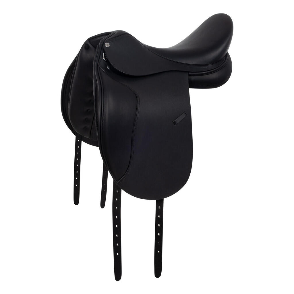Dressage saddle with removable blocks