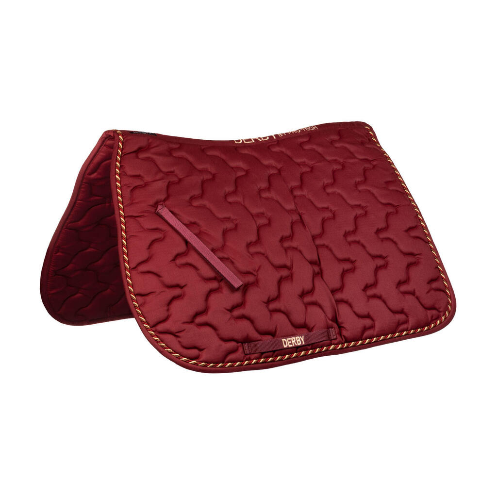 Saddle pad with piping cord