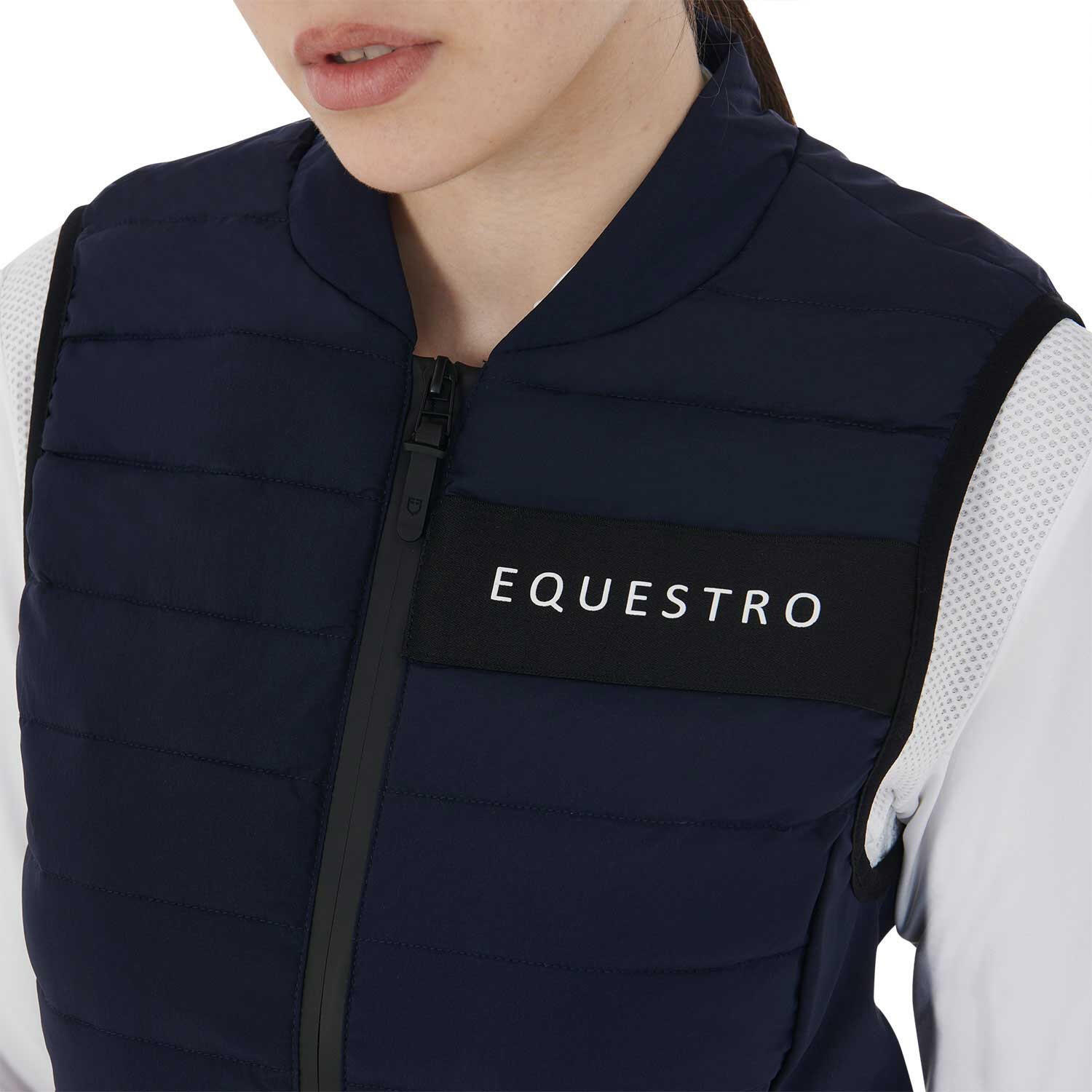 Chaleco femenino en tejido técnico cortavientos 4/6