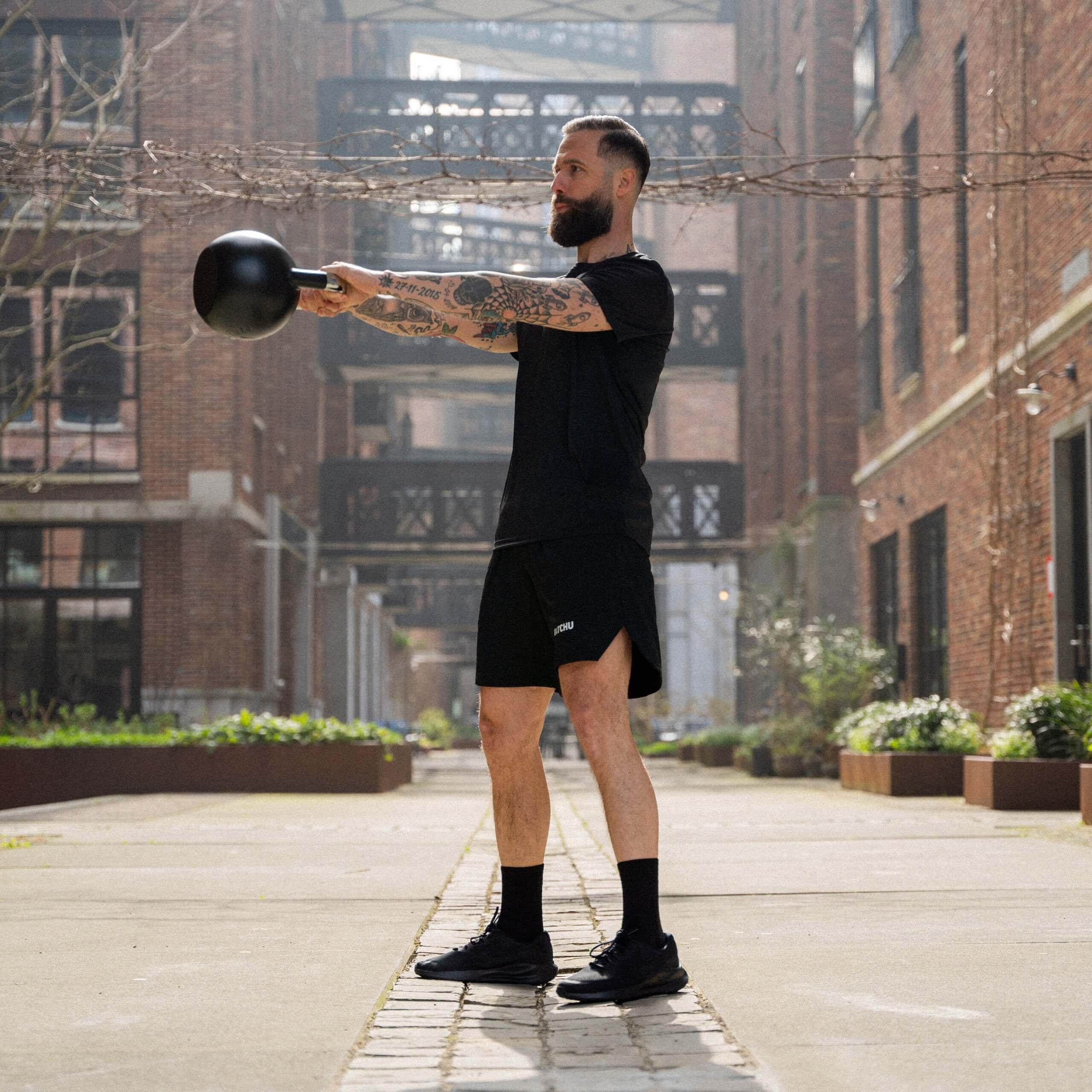 Kettlebell de compétition 4 kg en acier - Noir - 28 cm - Ø 21 cm - Acier 3/7