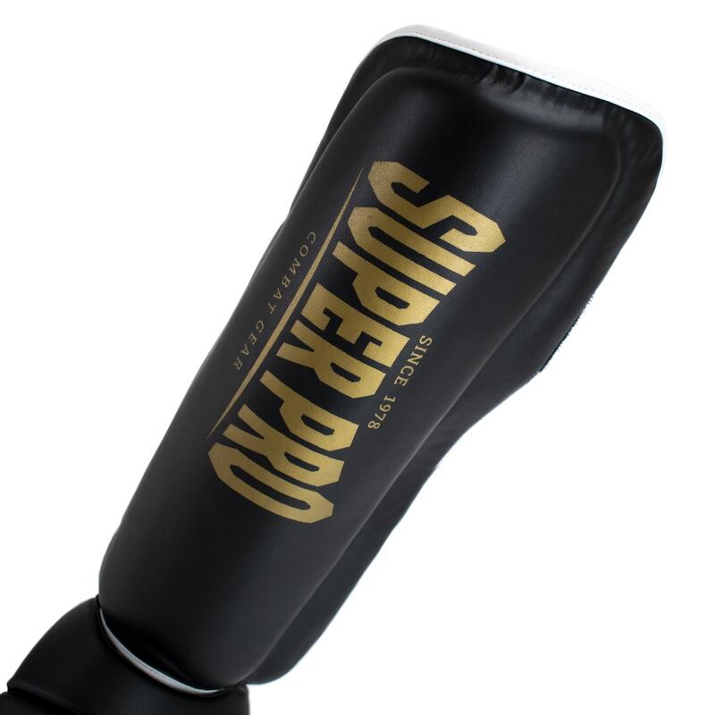 Super Pro Schienbeinschoner Protector, S, Schwarz-Gold