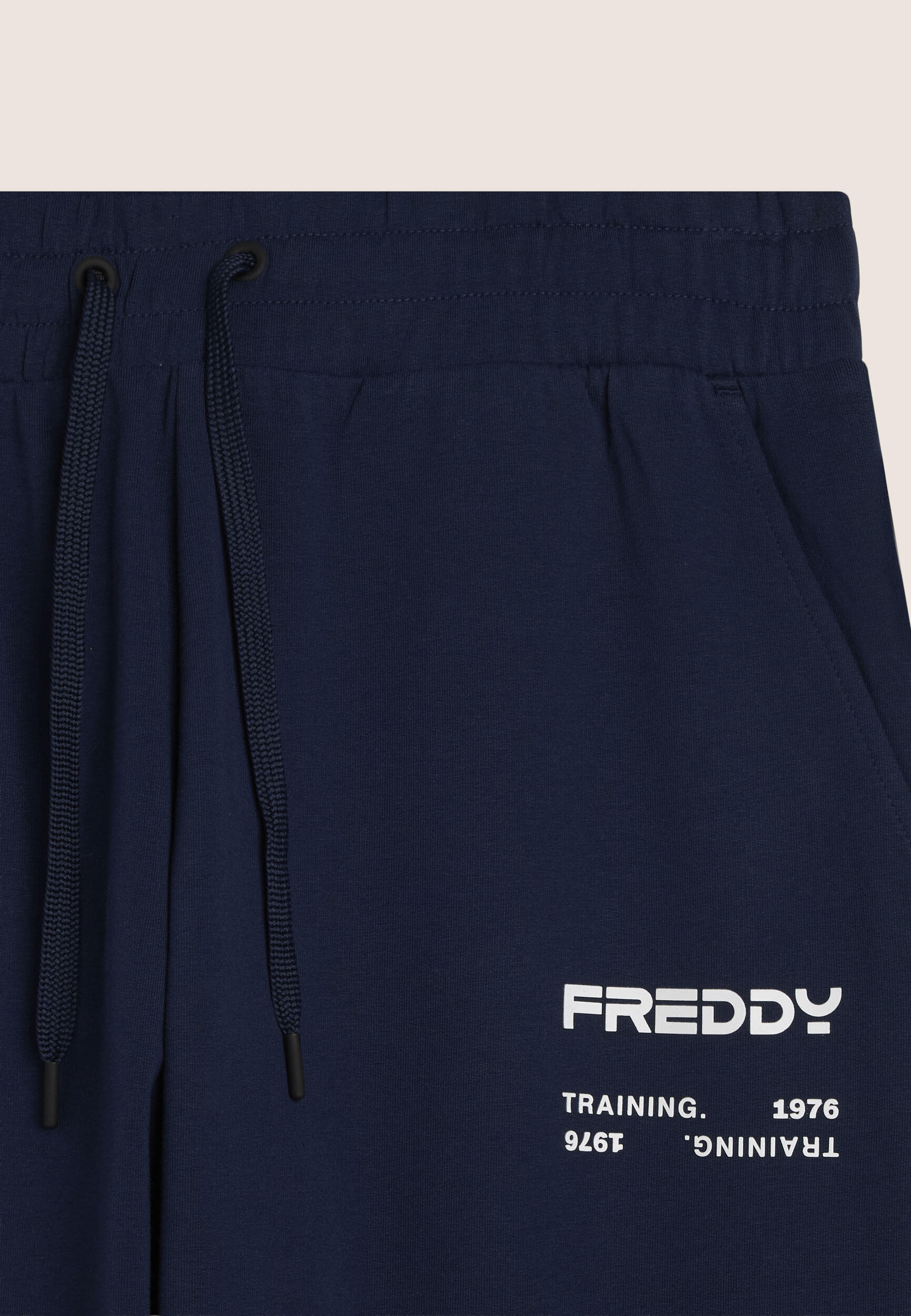 Pantalón deportivo con bandas laterales y bajos con puños 3/3