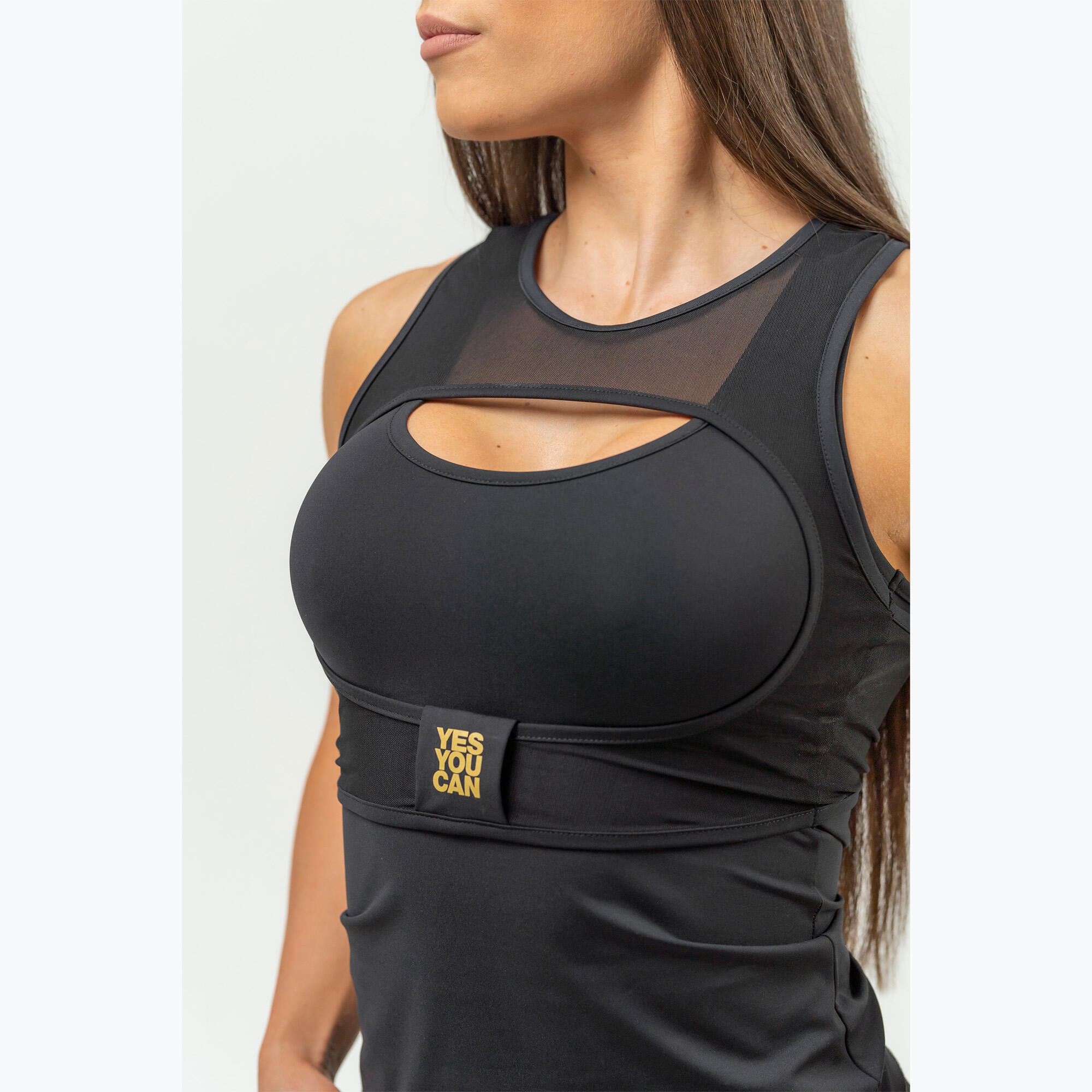 Top deportivo para mujer NEBBIA Ultra Intense negro/oro 6/7