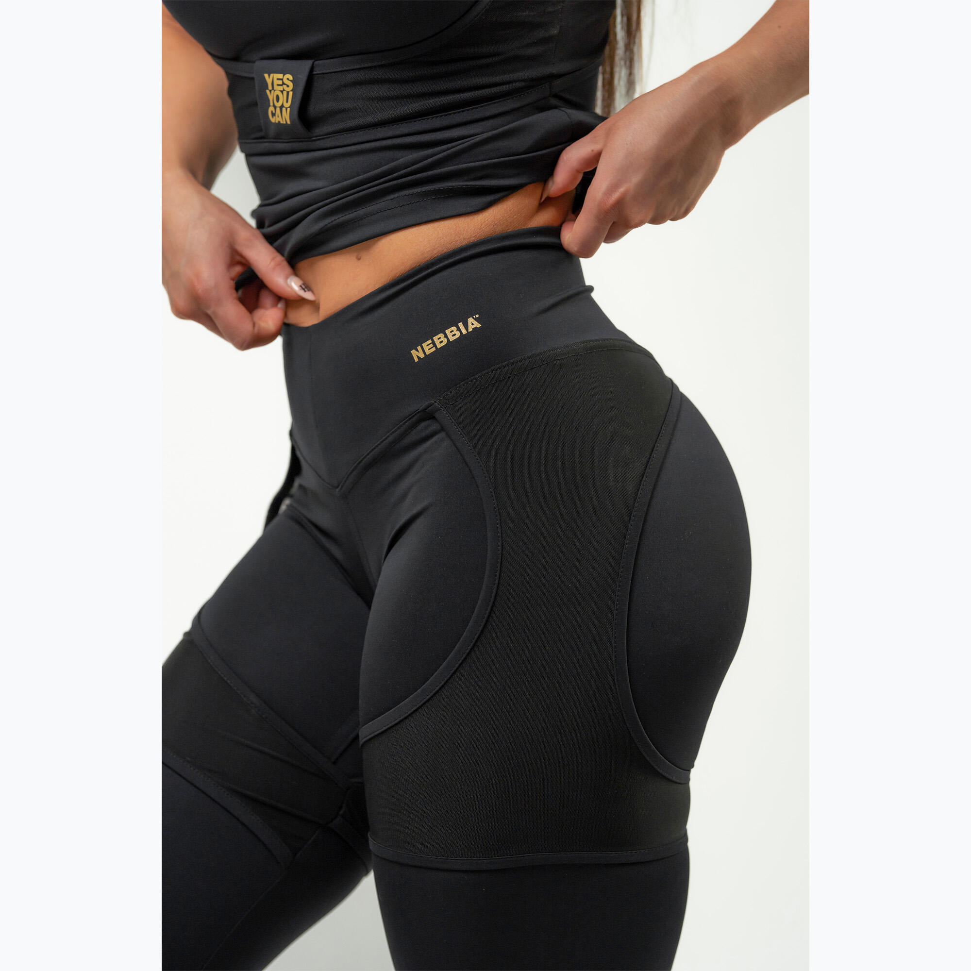 Top deportivo para mujer NEBBIA Ultra Intense negro/oro 7/7