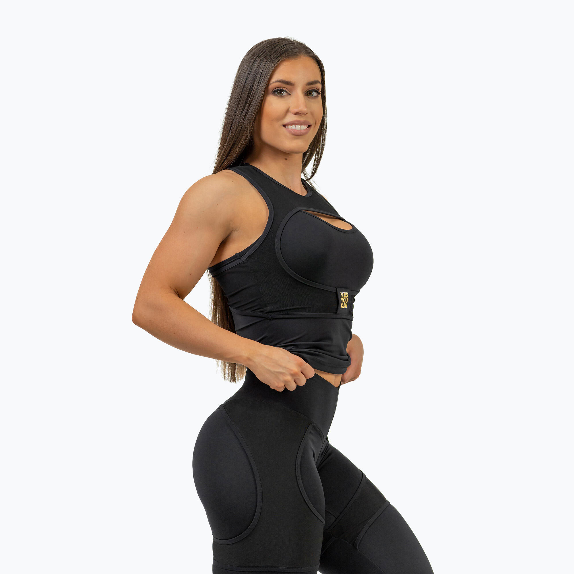 Top deportivo para mujer NEBBIA Ultra Intense negro/oro 4/7