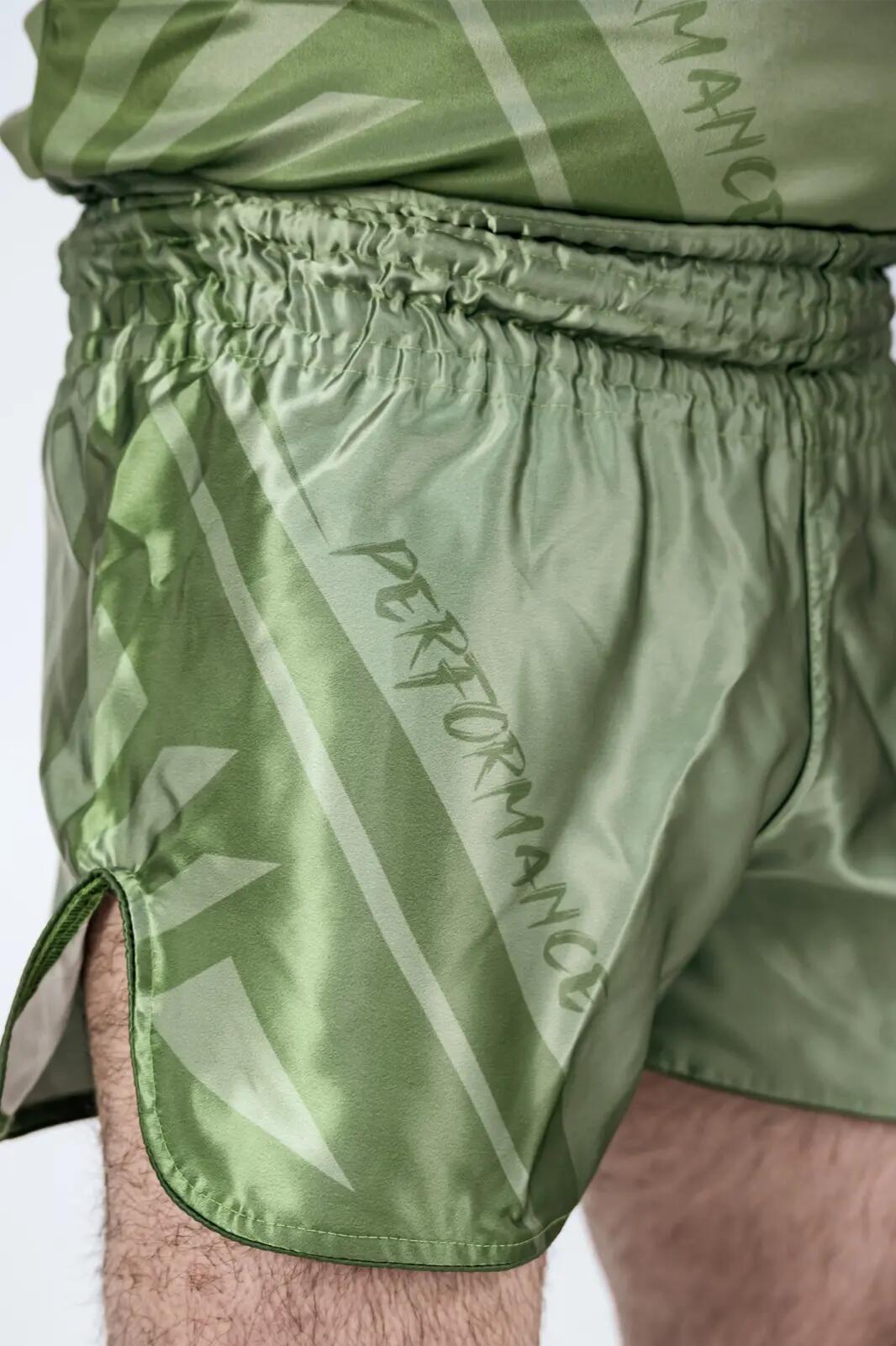 Short ARMURA Performance Verde Juniori 3/4