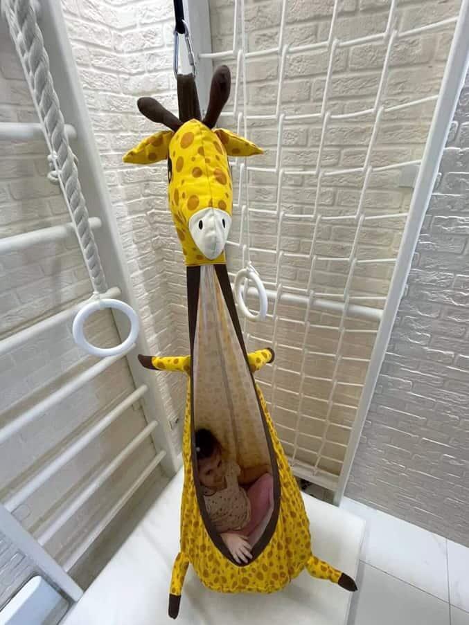 Balançoire cocon girafe 2/7