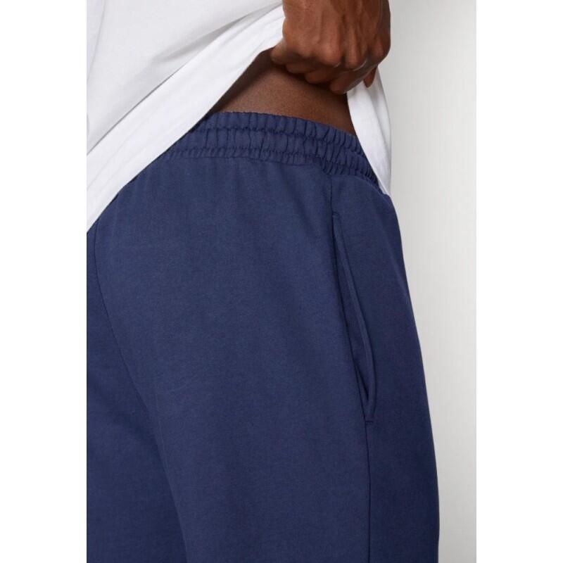 Calça comprida Reebok Andre navy em fleece, com punhos e cordão 3/4